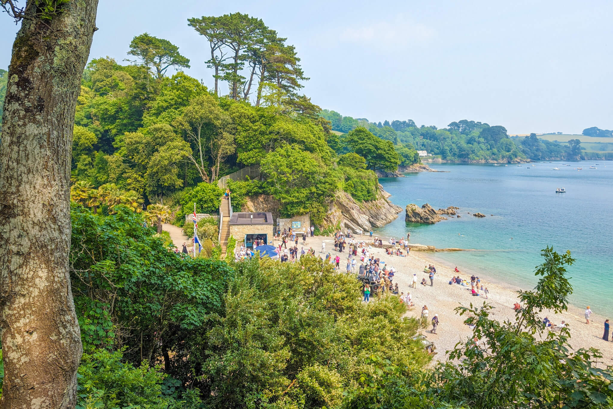 Visitors enjoying the day on Trebah Beach