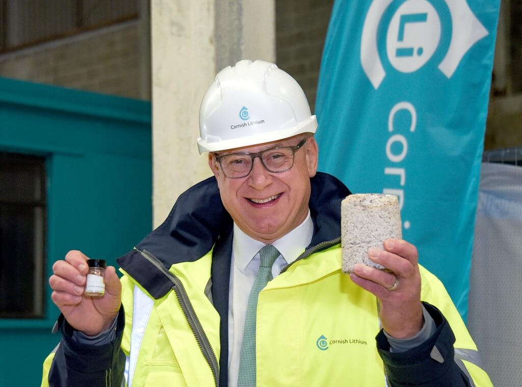 Jeremy Wrathall with extracted ore and finished product – Image Credit Cornish Lithium