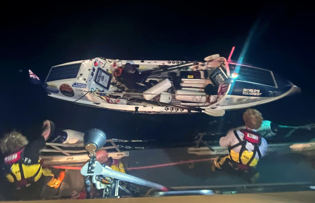 The rowing boat lifted from the water at Newlyn after the overnight rescue