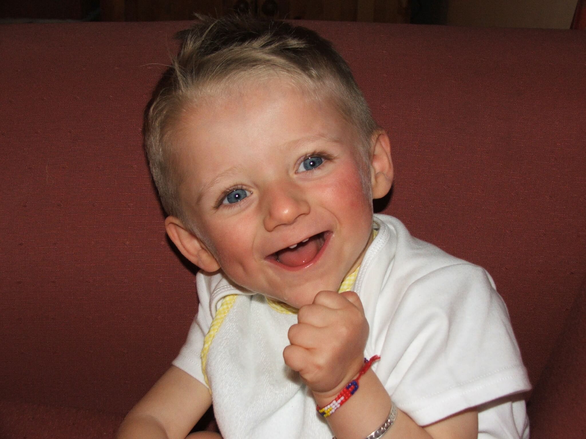Joe Way as a young boy, smiling