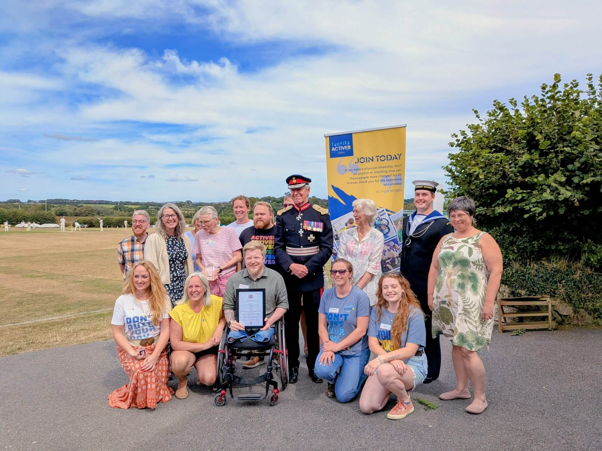 Active8 group photo with the Lord-Lieutenant of Cornwall holding the King's Award certificate