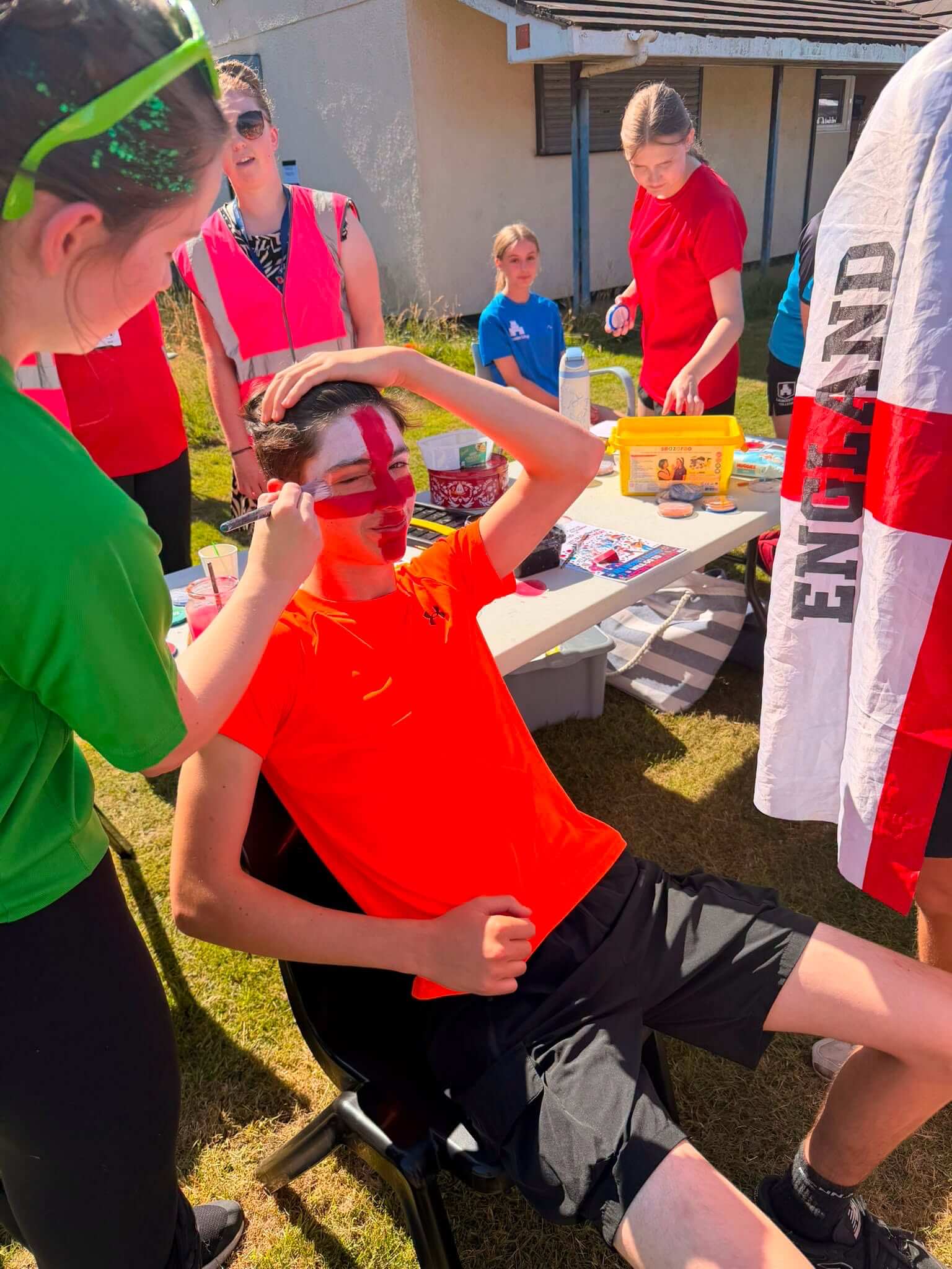 A student has an England flag painted on his face at Launceston College sports day