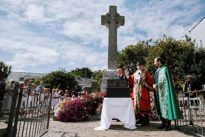 The Knill Trustees open the ceremony at the War Memorial Gardens beside the Celtic cross in St Ives