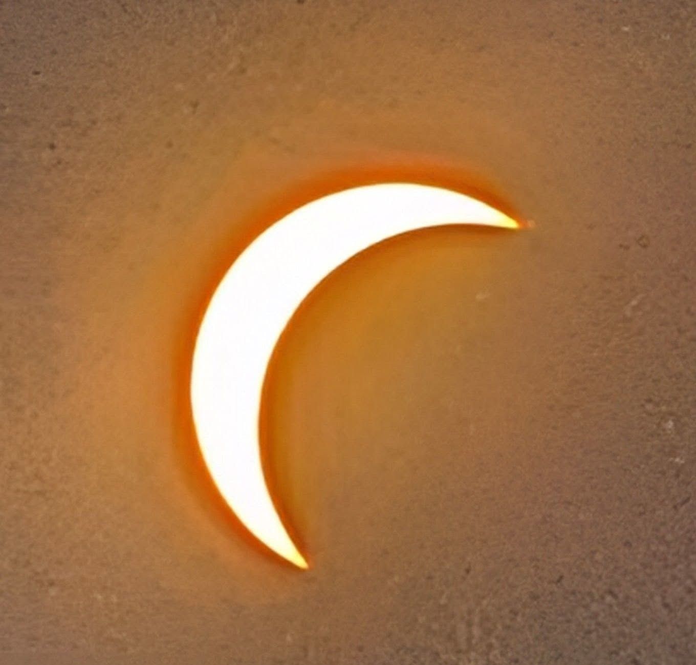 Partial solar eclipse over Cornwall, photographed by Marina Dee