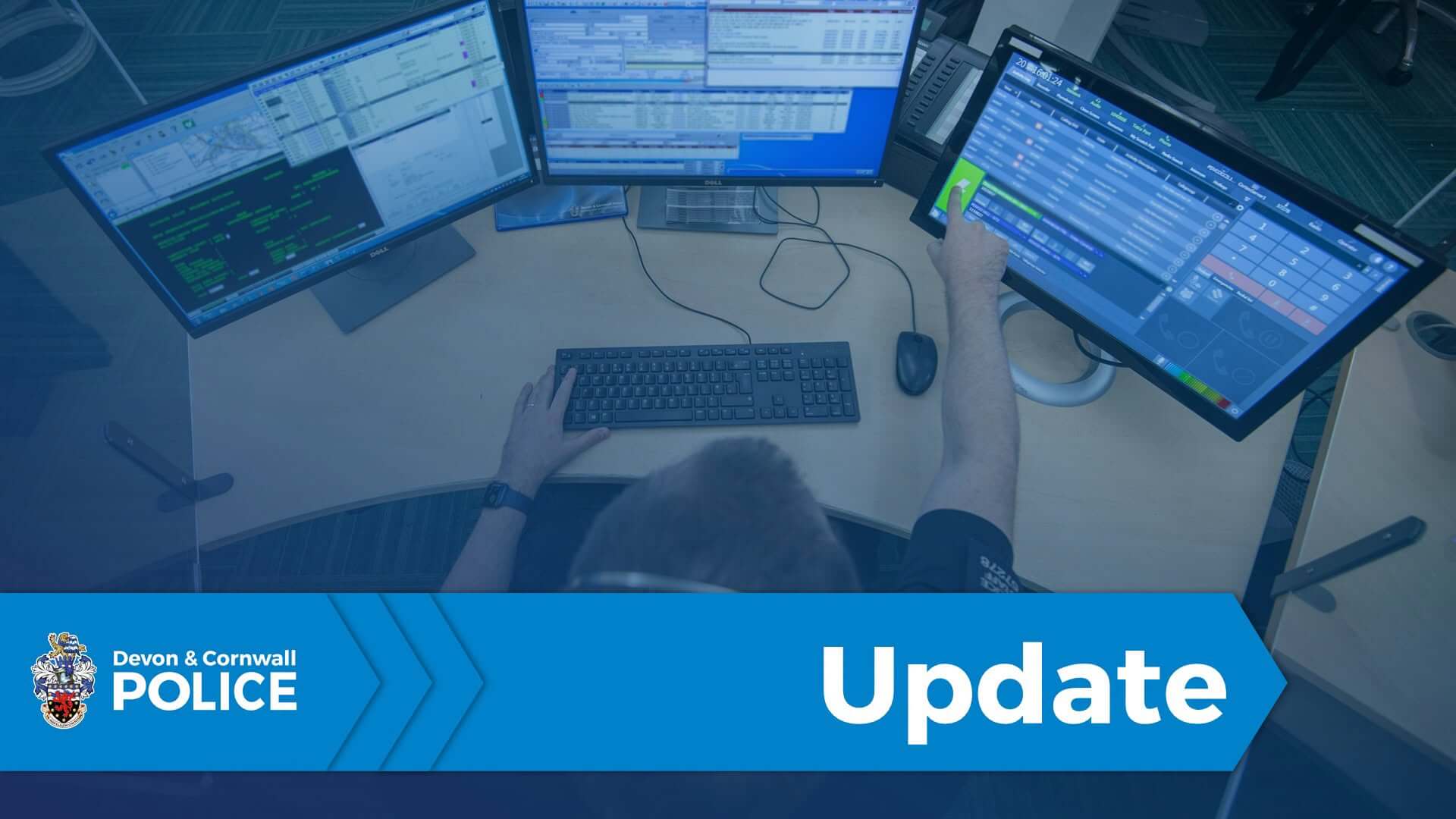 Devon and Cornwall Police control room operator at multiple screens