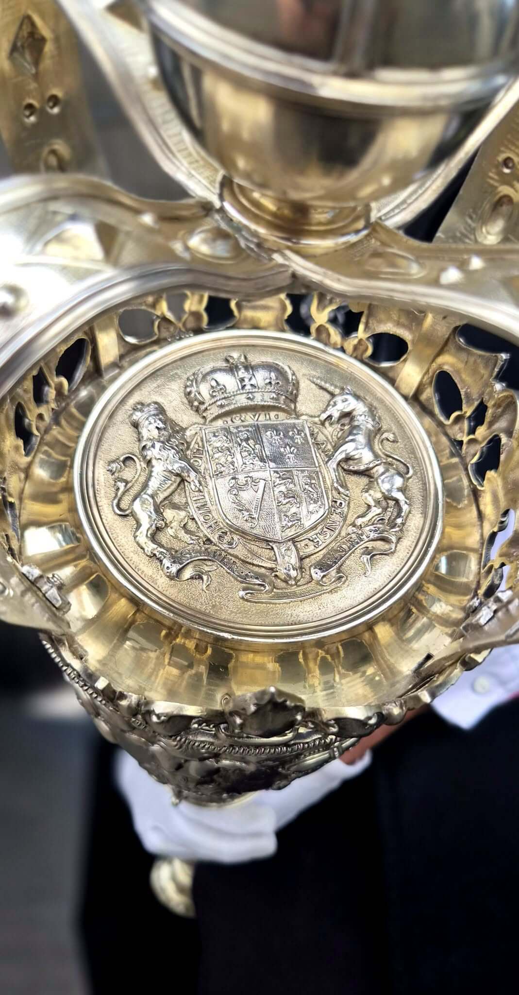 Close-up of a ceremonial silver mace head carried in the Liskeard parade