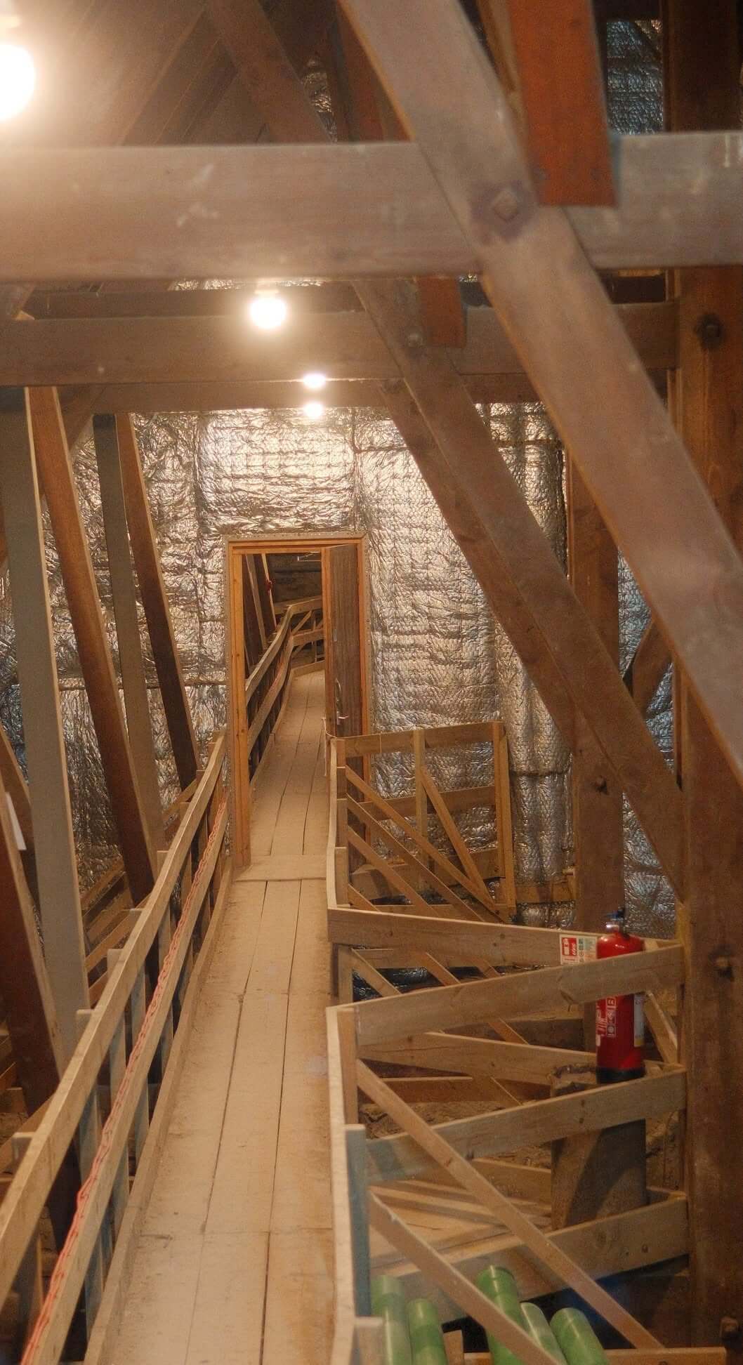 A wooden walkway through the insulated roof void at Truro Cathedral