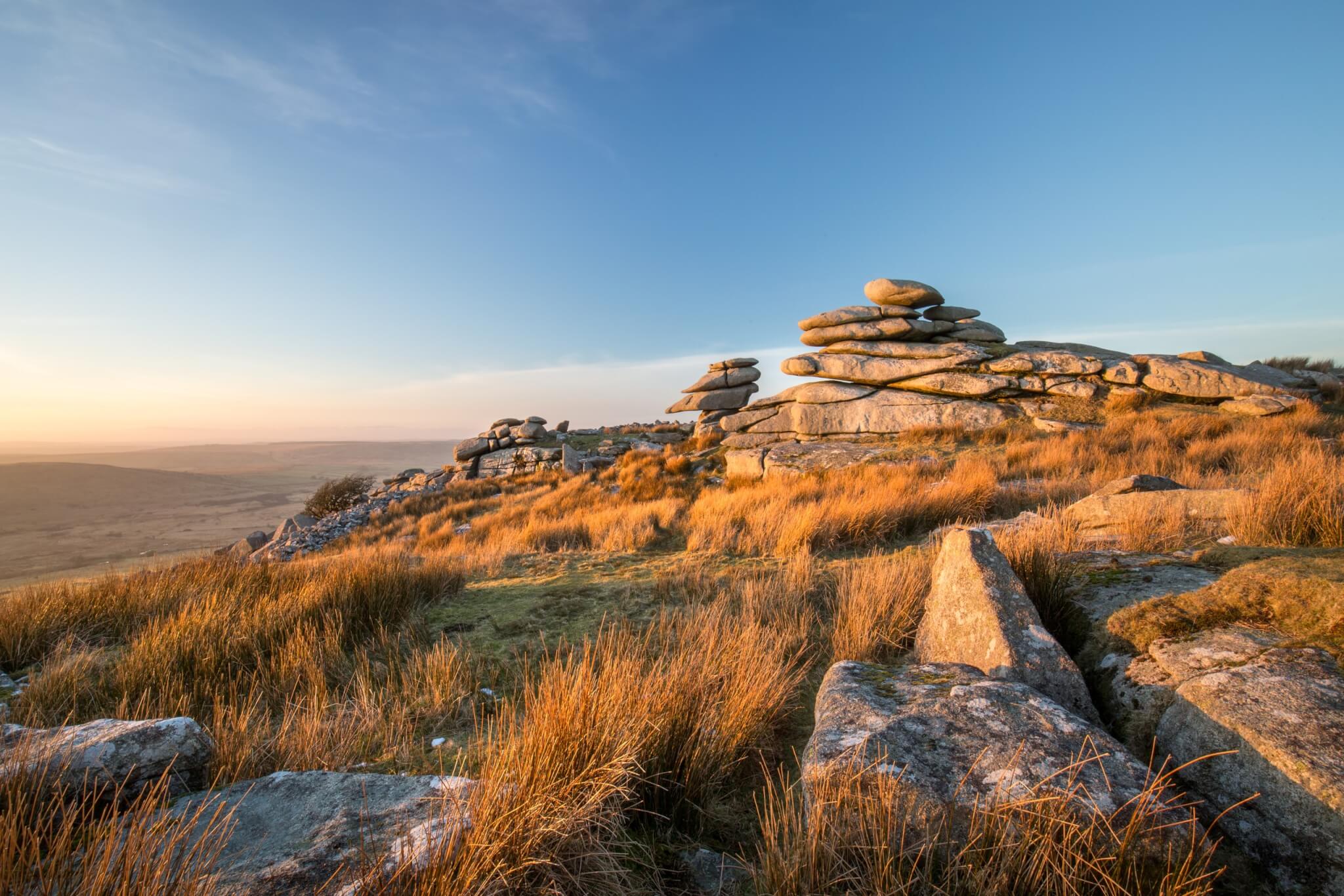 Golden evening light on the Cheesewring, a natural granite tor above Minions on Bodmin Moor
