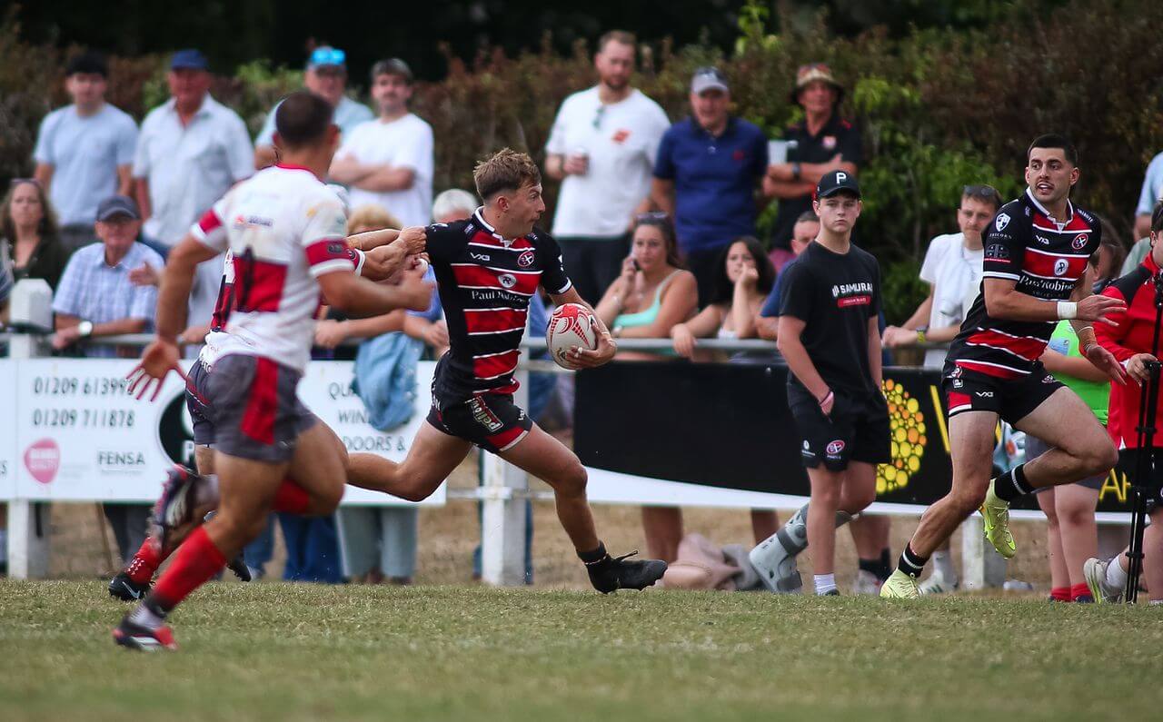 Cornish Pirates wing Arthur Relton runs with the ball against Camborne