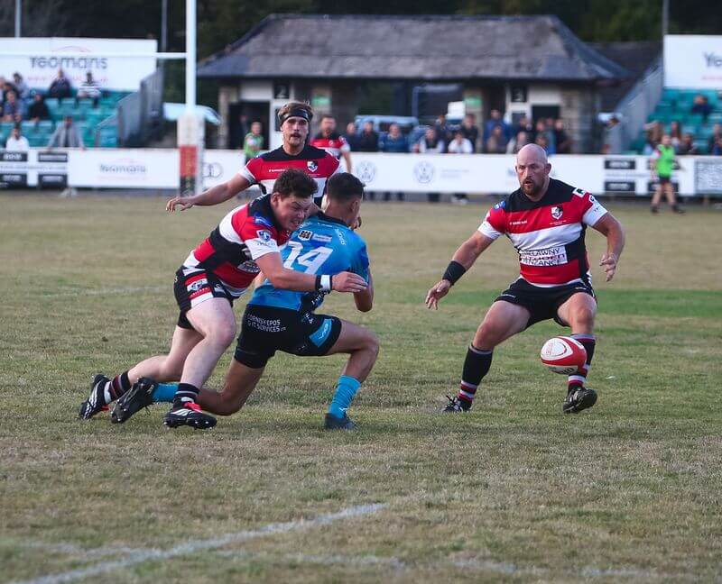 Penzance and Newlyn winger Callum Walsh tackles his opposite number