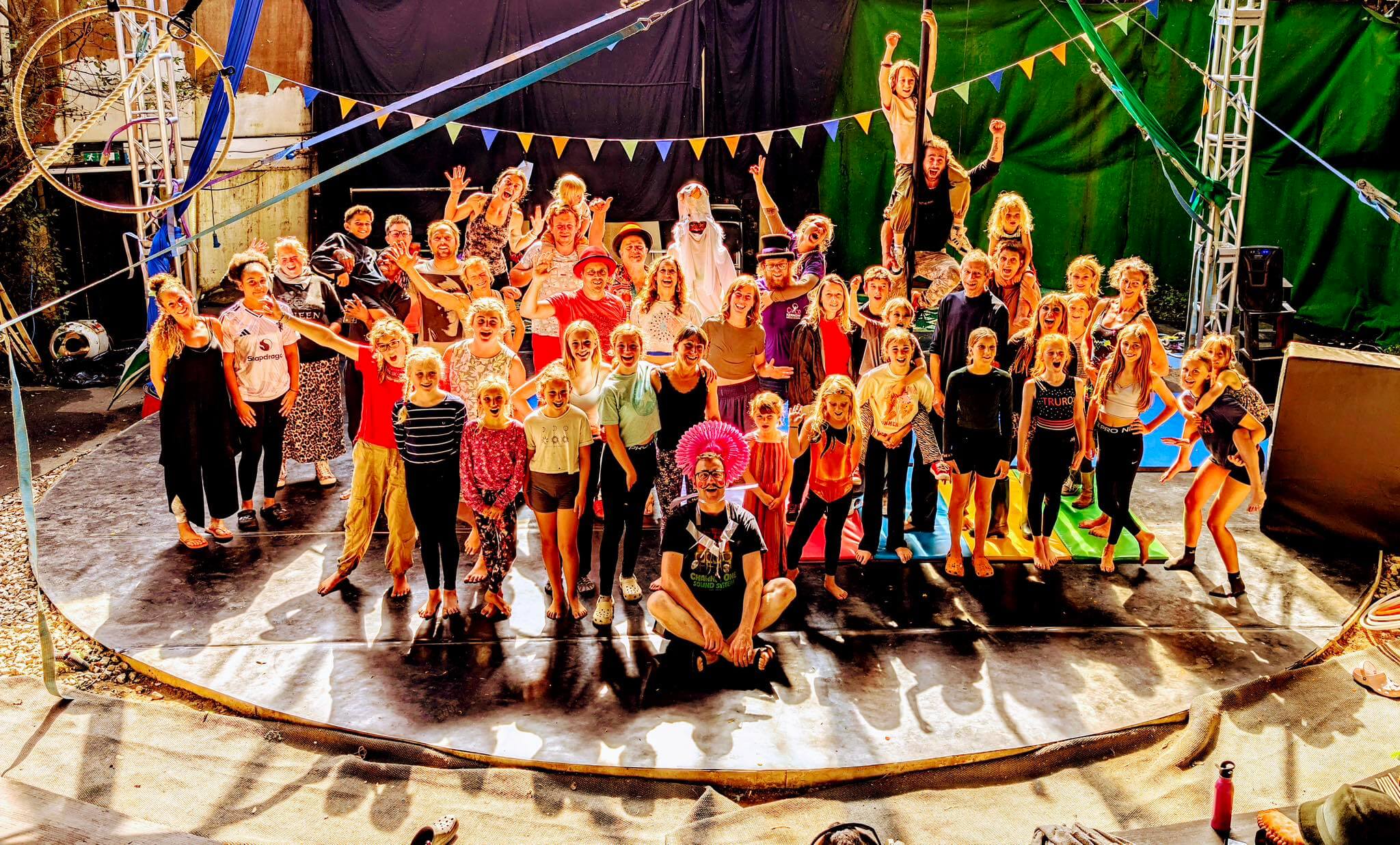 Large group of children and adults on the circus floor at Chyan Cultural Centre