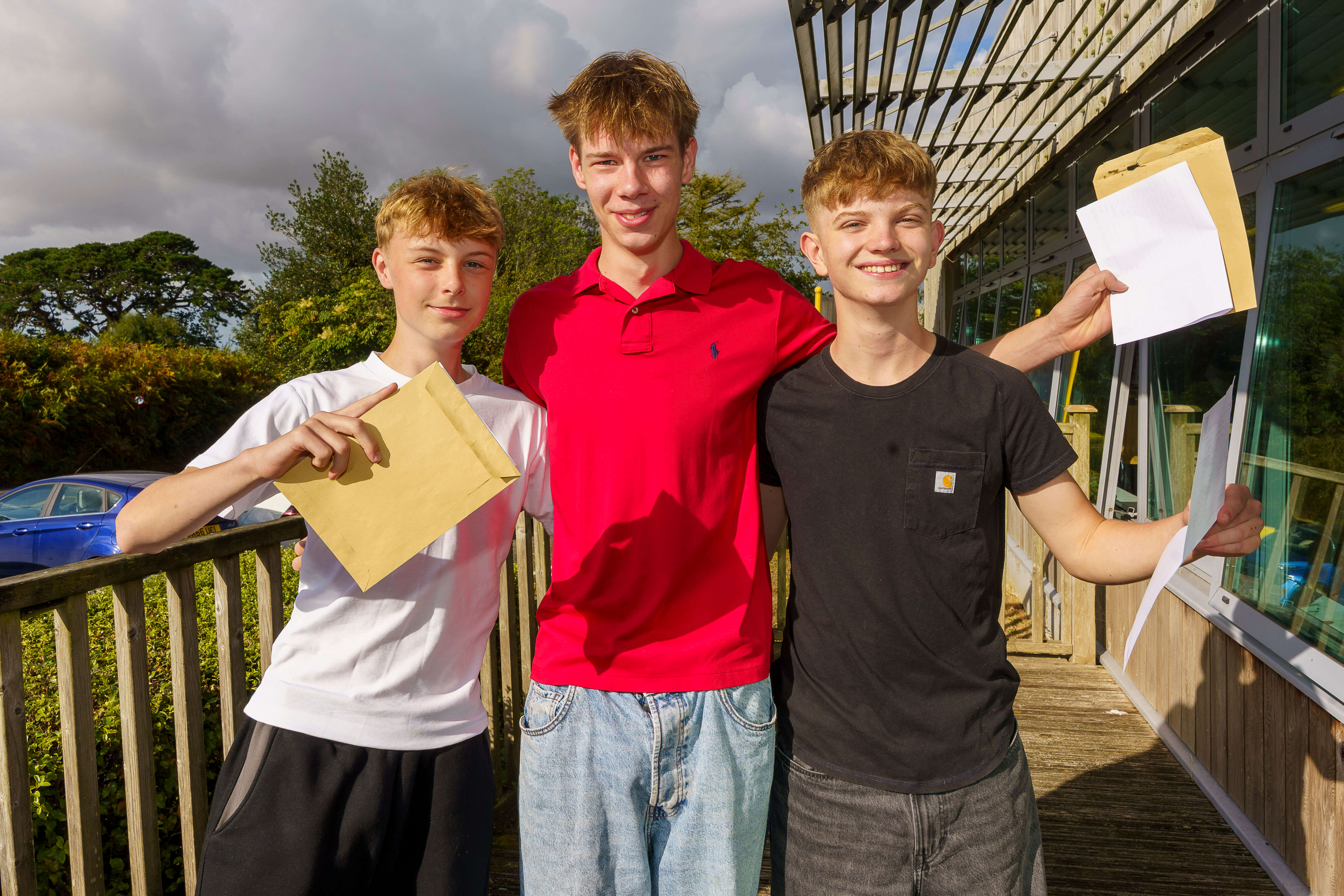 Roseland Academy students with their GCSE results envelopes