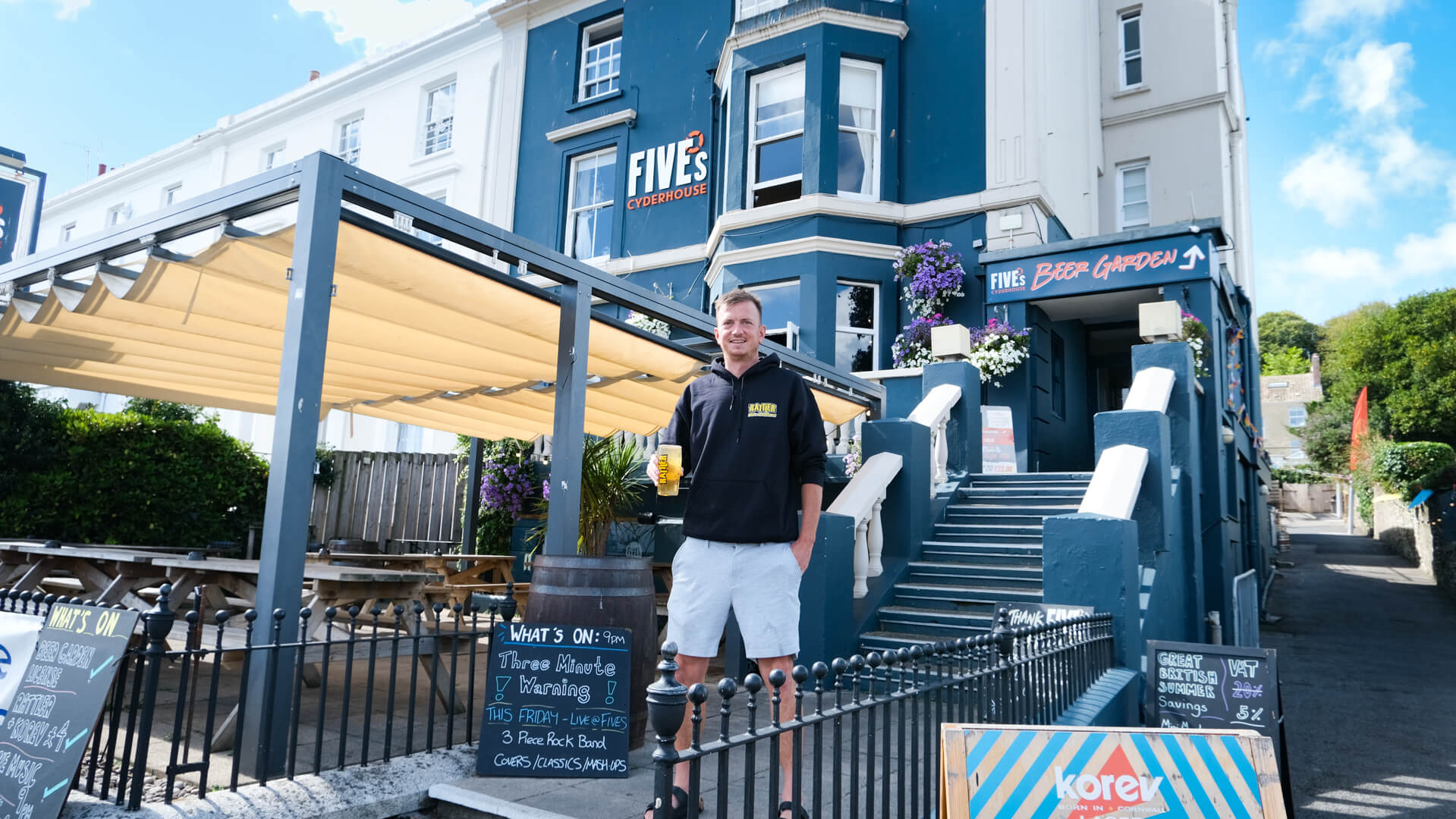 Fives Cyderhouse exterior with retractable canopy over the beer garden