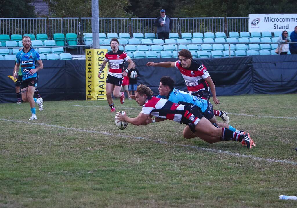 Harris Eddy dives over to score a try for Penzance and Newlyn against Redruth