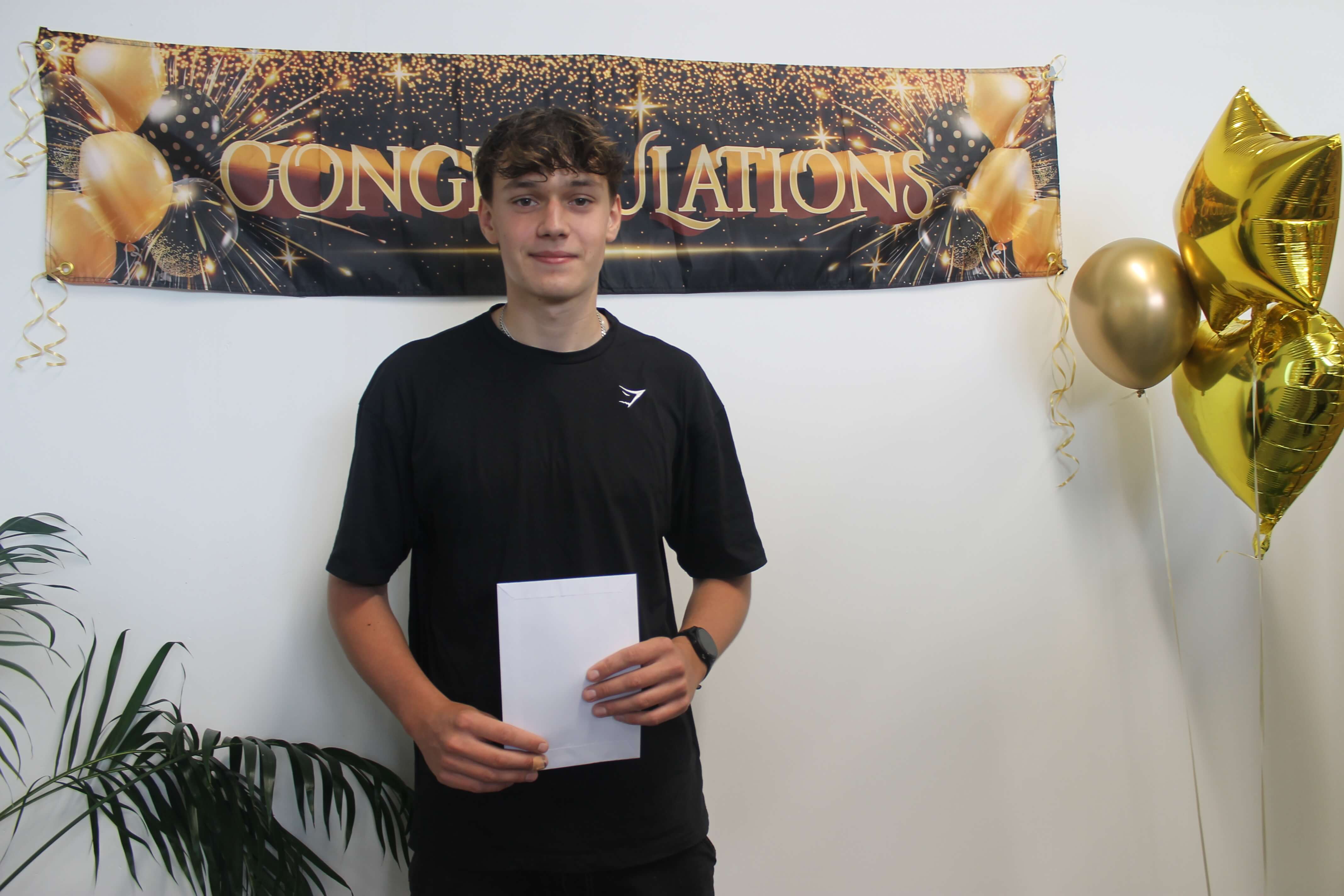 A Bodmin College student celebrating GCSE results