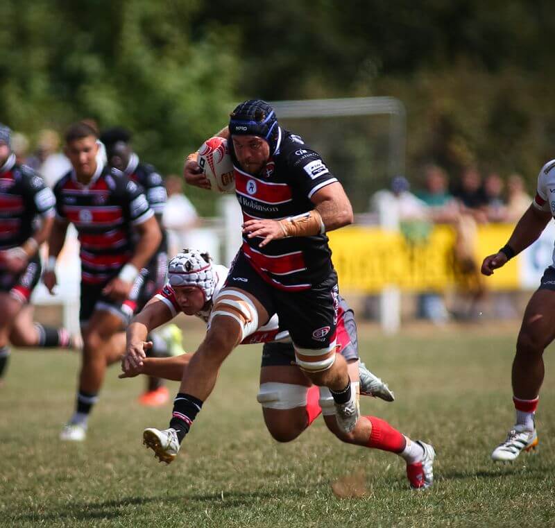 Cornish Pirates lock Milo Hallam carries the ball against Camborne