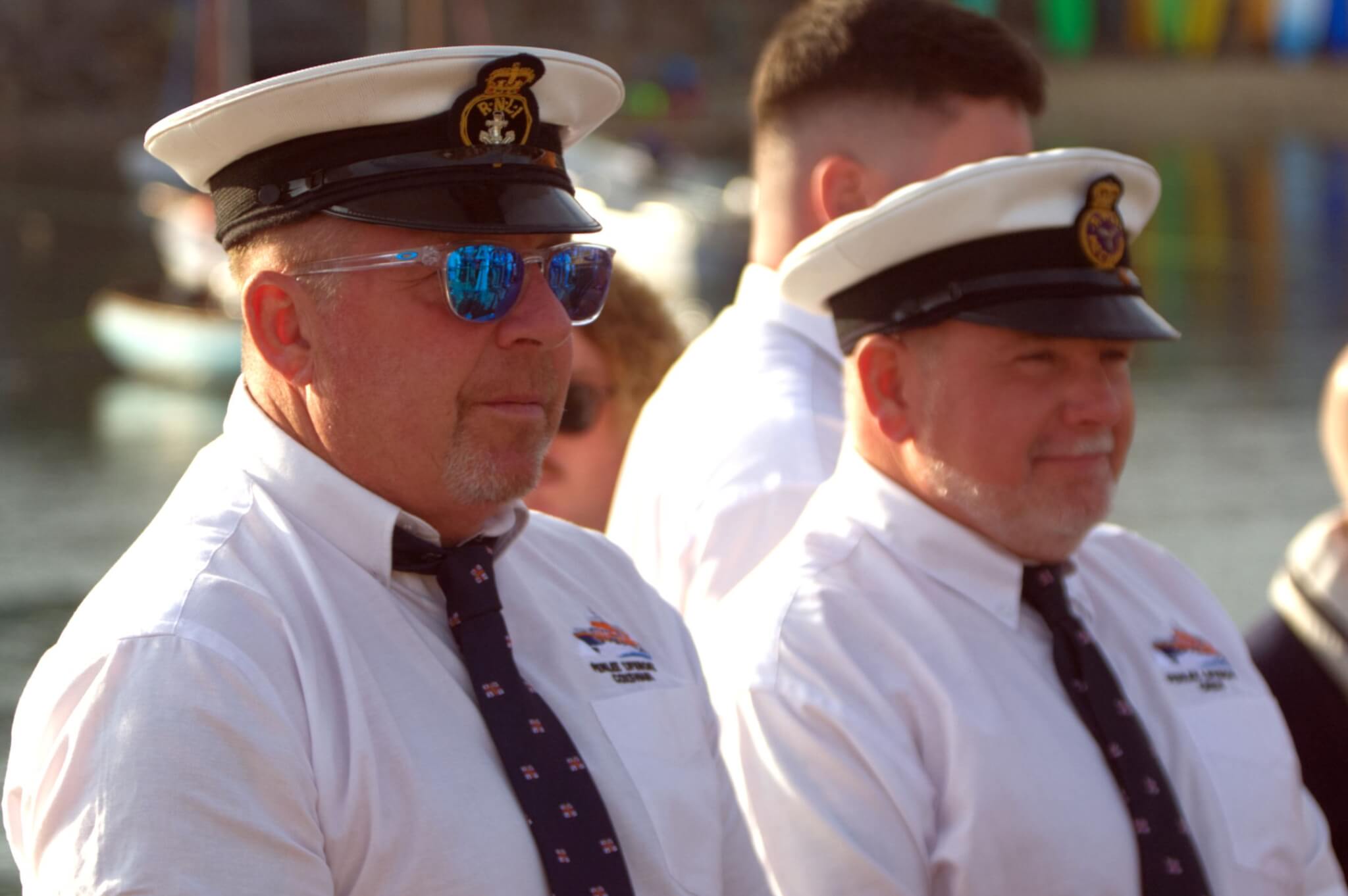 Two Penlee RNLI coxswains in dress uniform at the blessing service