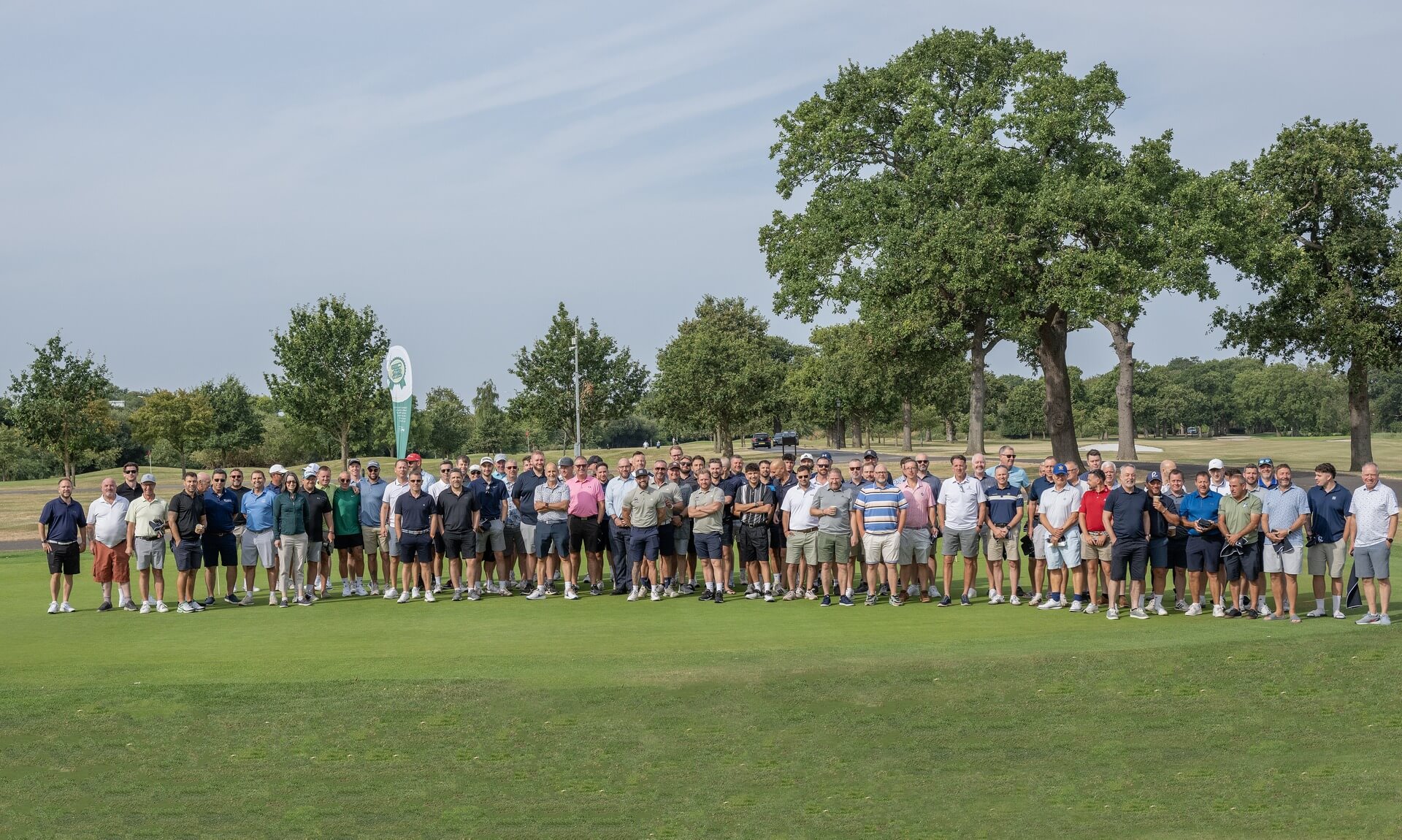 Group of more than 100 golfers gathered on the fairway at the Barratt Bristol charity golf day