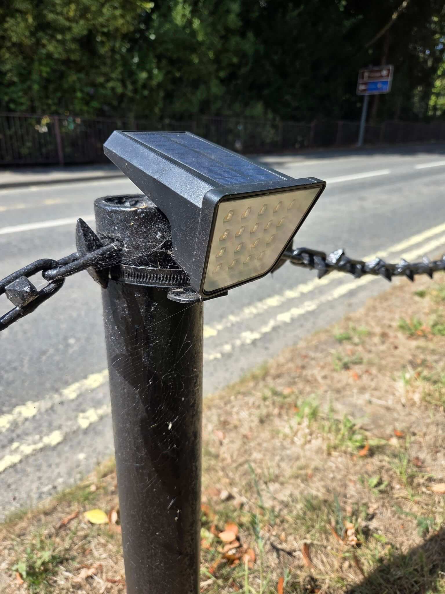 A solar light still fitted to a bollard in Mevagissey's Valley Road garden area
