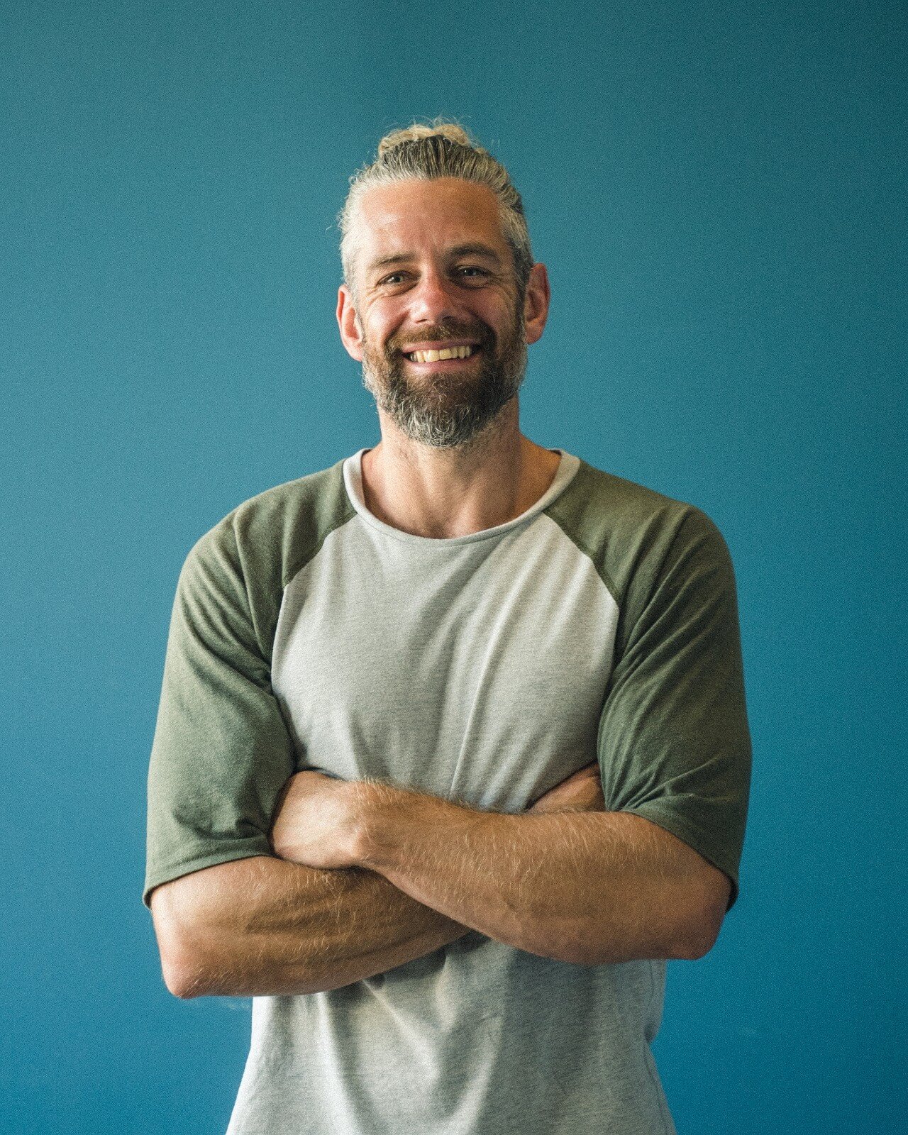 David 'Jacko' Jackson smiling with arms folded