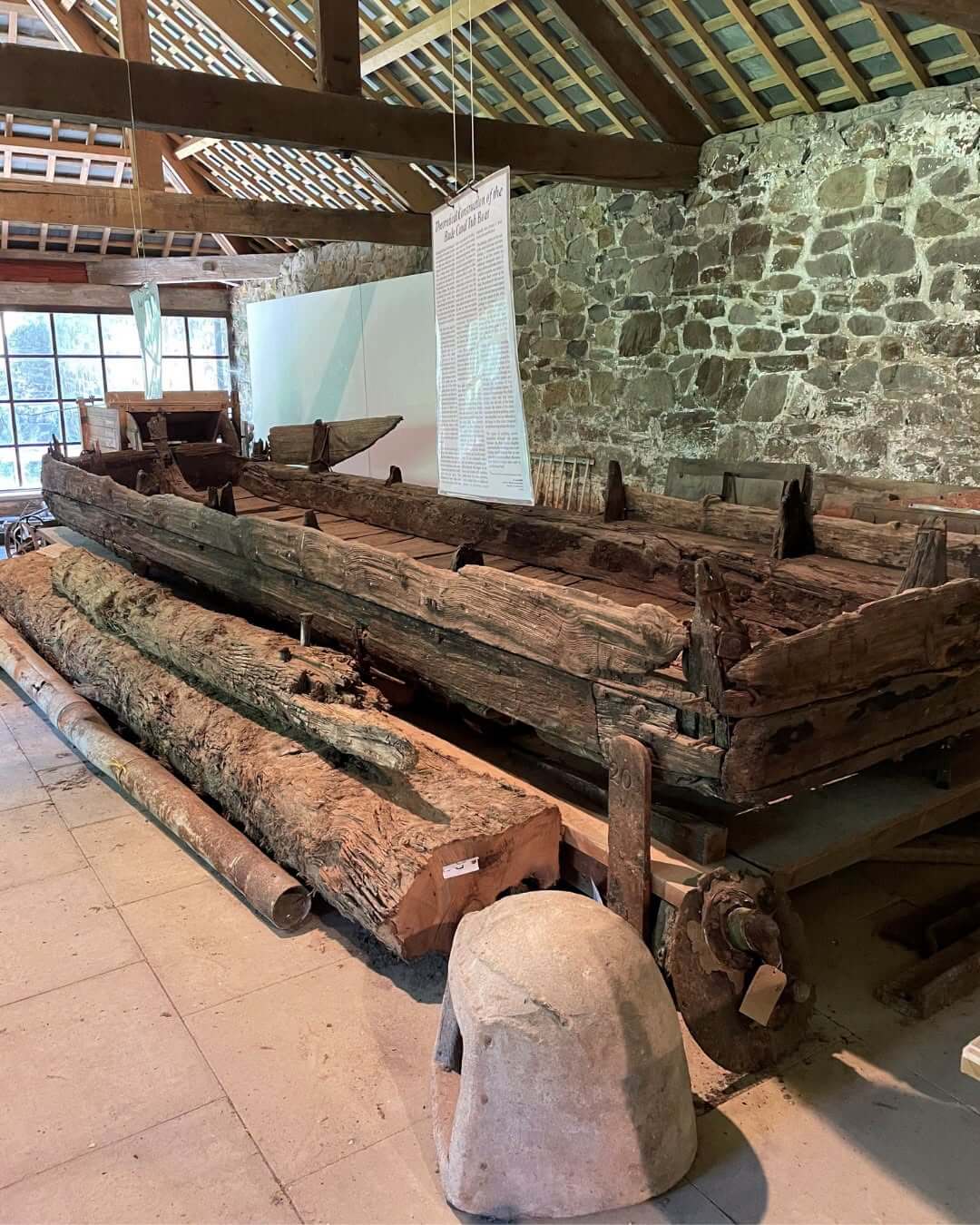 The Bude Canal Tub Boat on display inside the Canal Barge Workshop