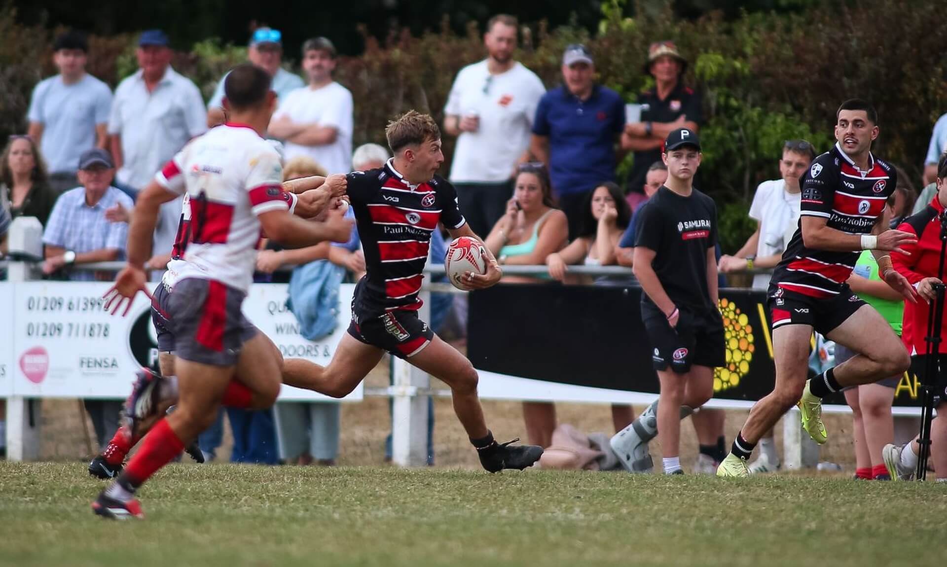 Cornish Pirates wing Arthur Relton runs with the ball against Camborne