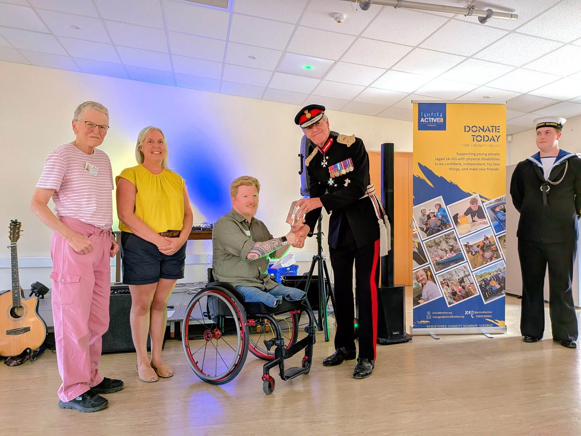 The Lord-Lieutenant of Cornwall presents the King's Award crystal to Active8