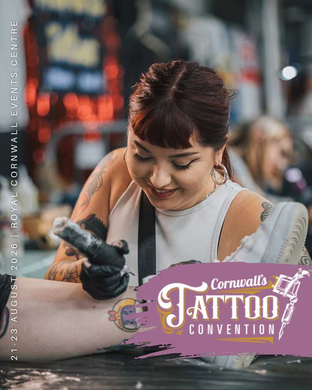 A tattoo artist at work at the Cornwall Tattoo Convention