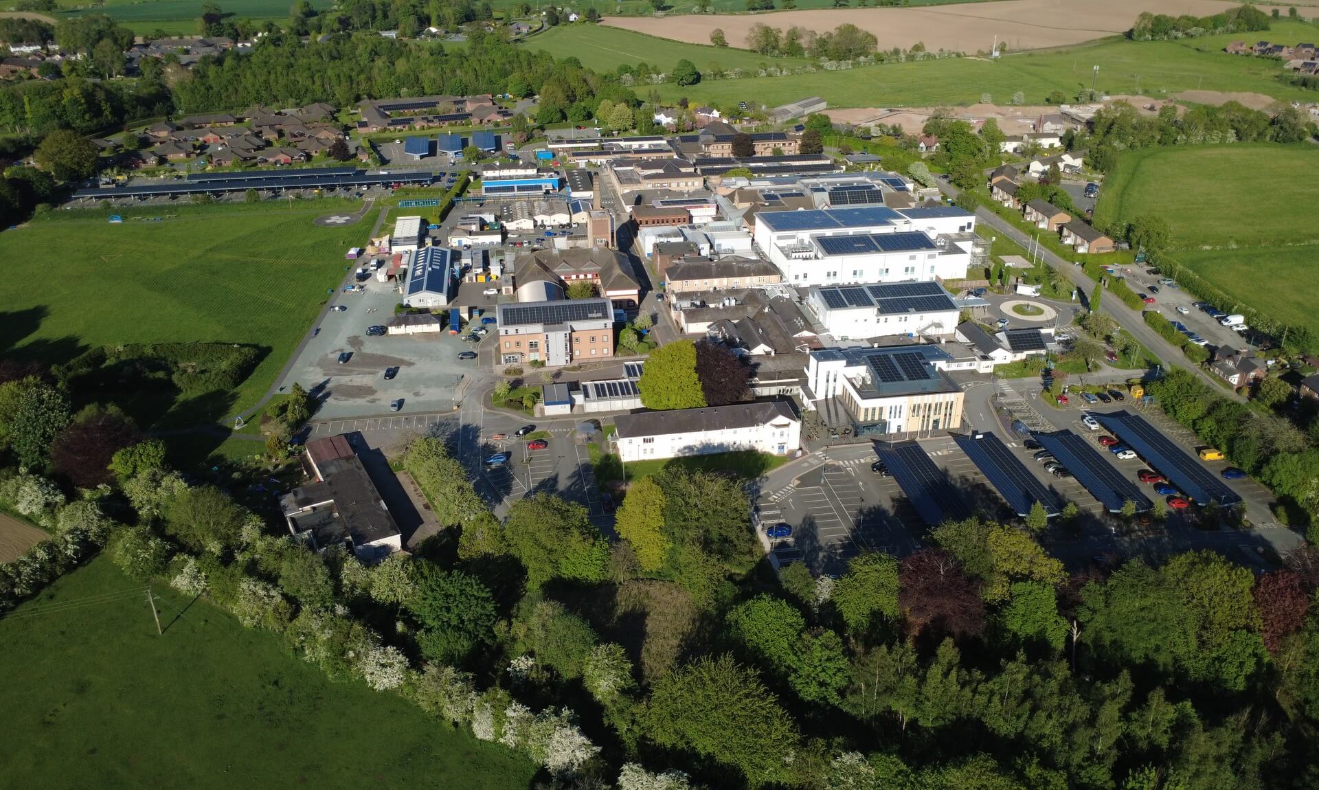 Aerial view of the Robert Jones and Agnes Hunt Orthopaedic Hospital with solar panels on its rooftops