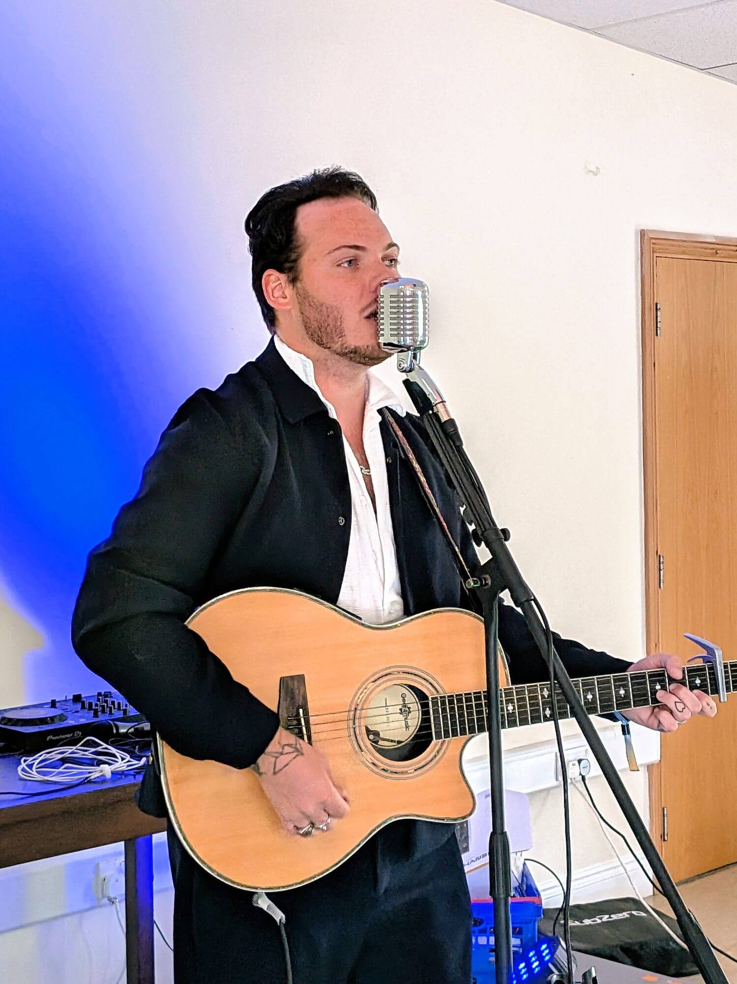 Local performer Sonny Palmer singing at the Active8 celebration