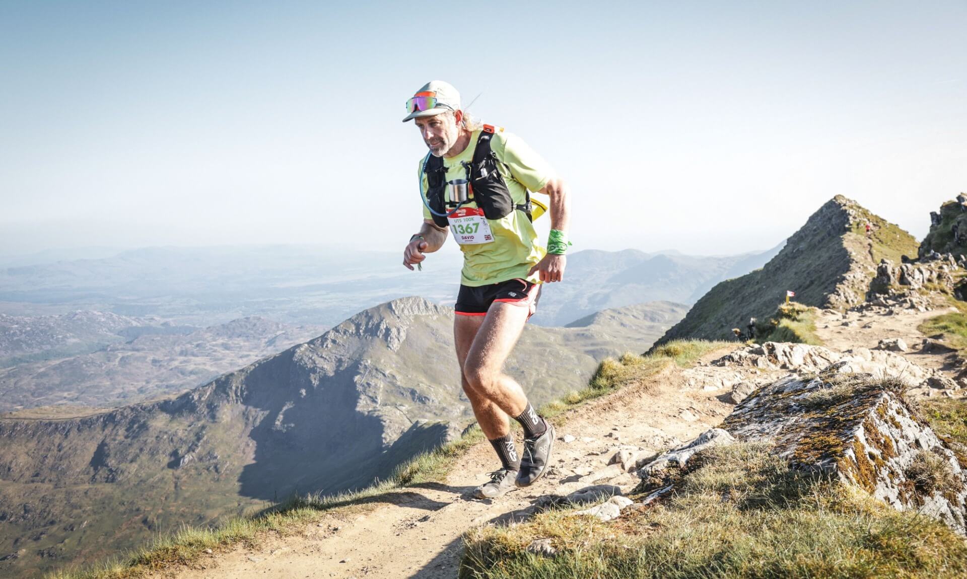 David 'Jacko' Jackson running an ultramarathon on a mountain ridge
