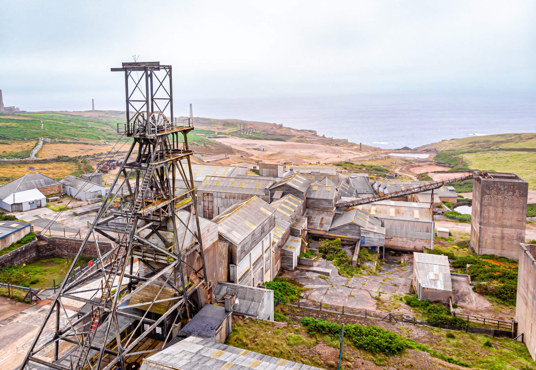 The Geevor Tin Mine headframe and works on the clifftop above the Atlantic