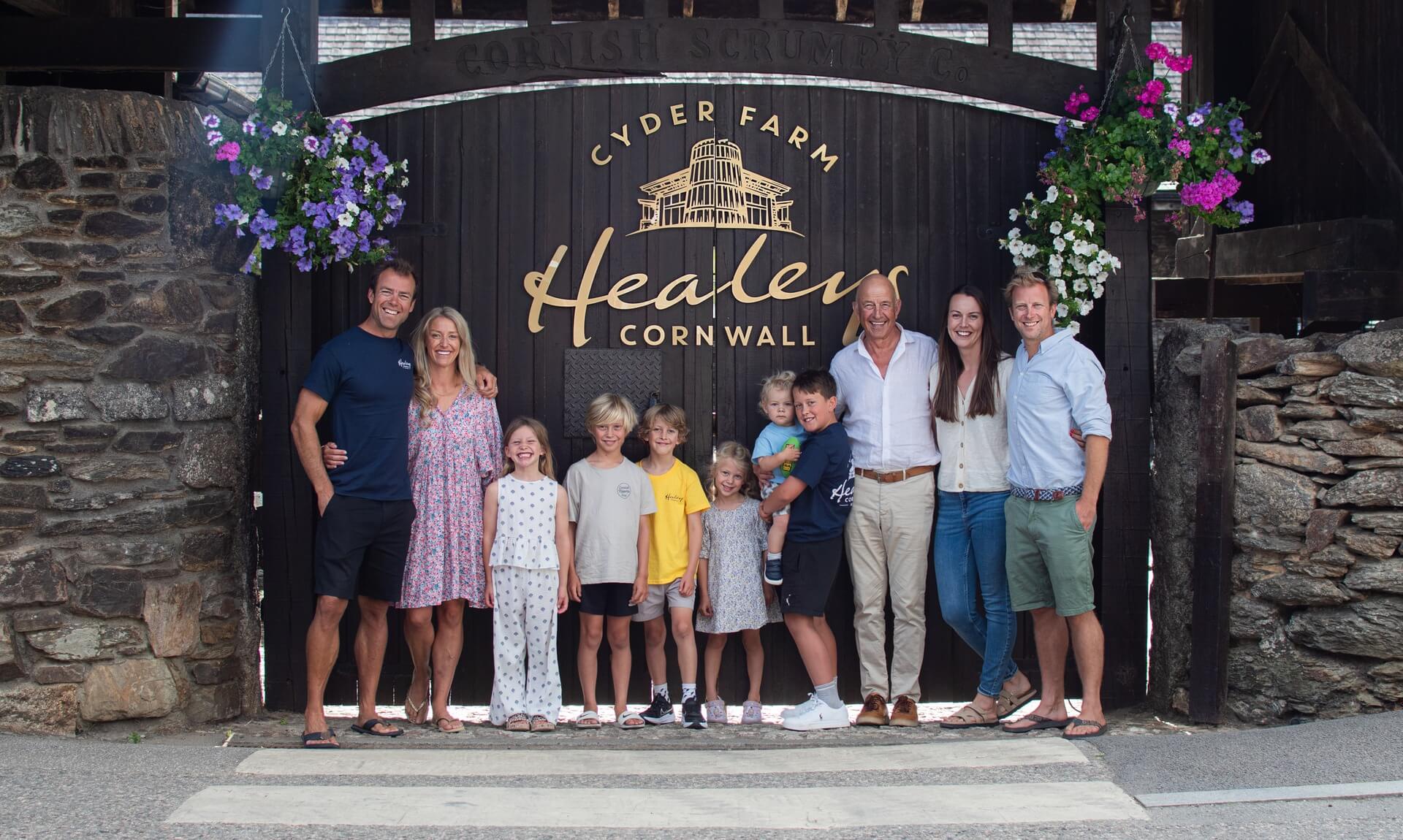 The Healey family outside the Healeys Cornish Cyder Farm gate at Penhallow