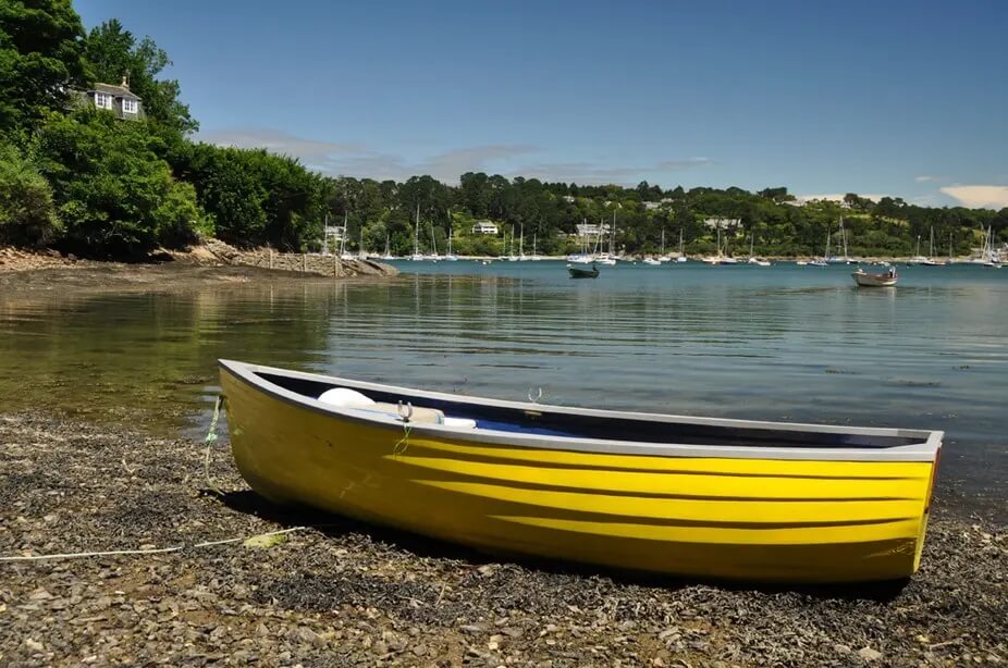 A yellow rowing boat on the Helford River near Frenchman's Creek