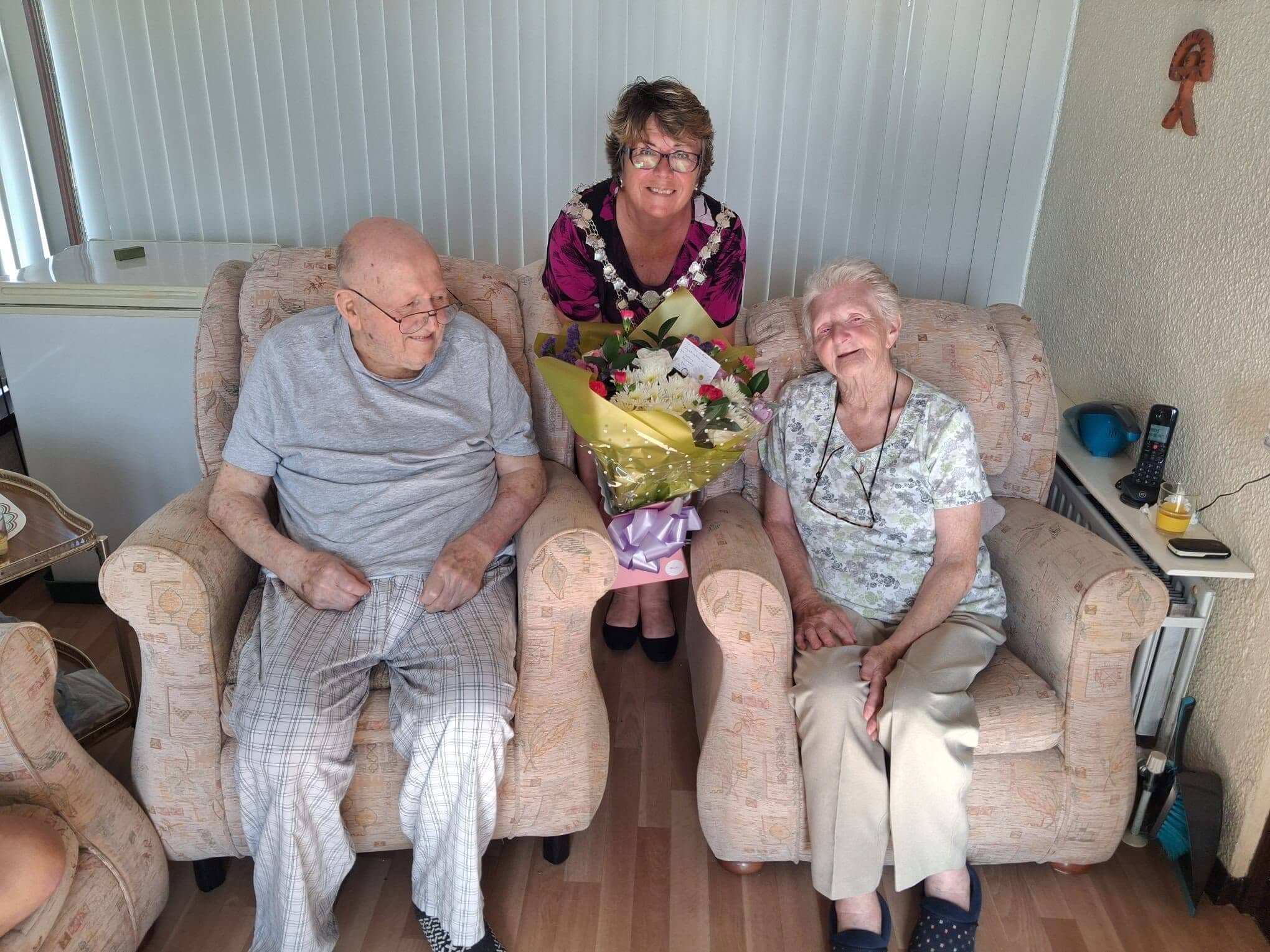 Torpoint's Town Mayor with Brian and Joan Jones and an anniversary bouquet