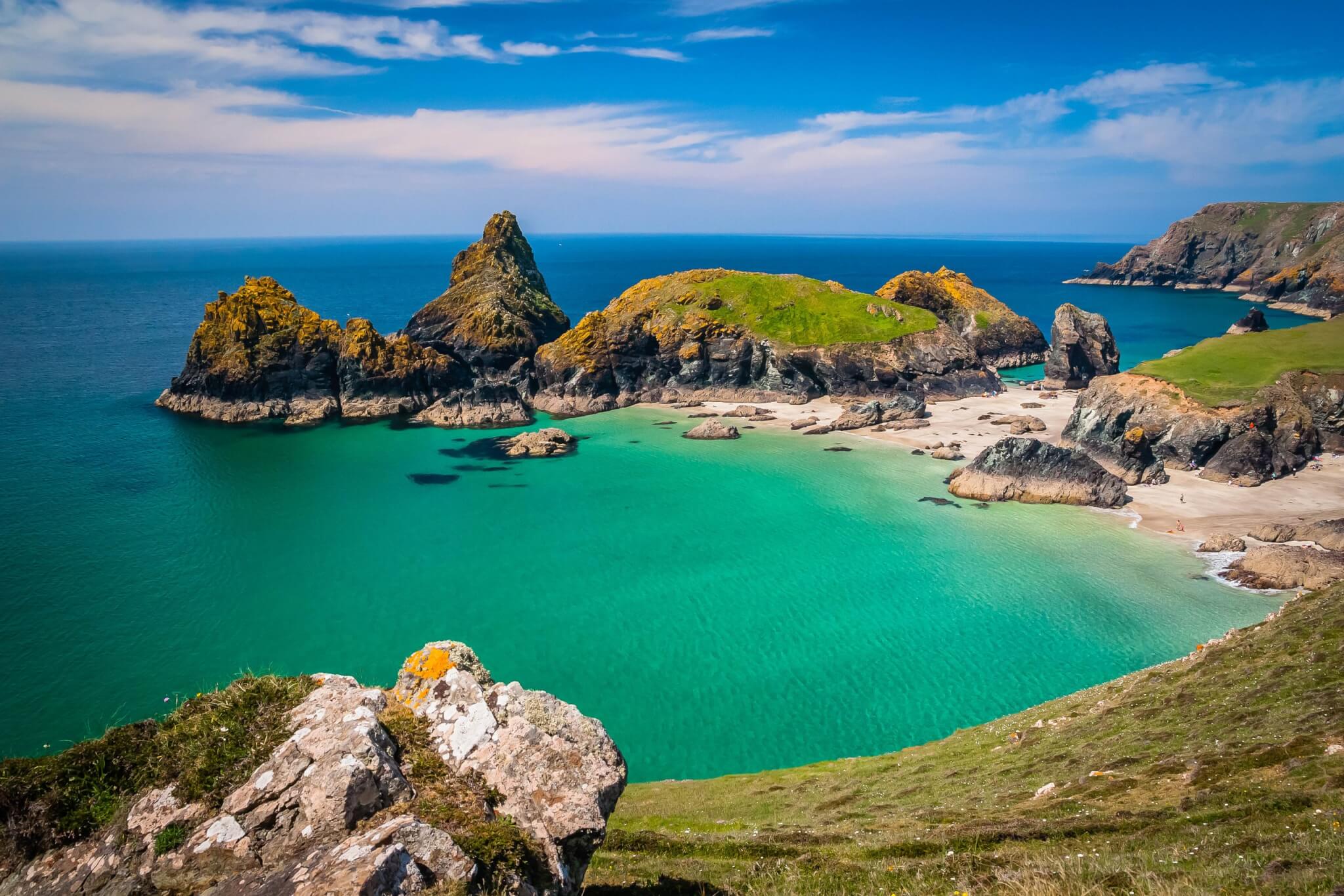 Turquoise water and serpentine rock stacks at Kynance Cove on the Lizard