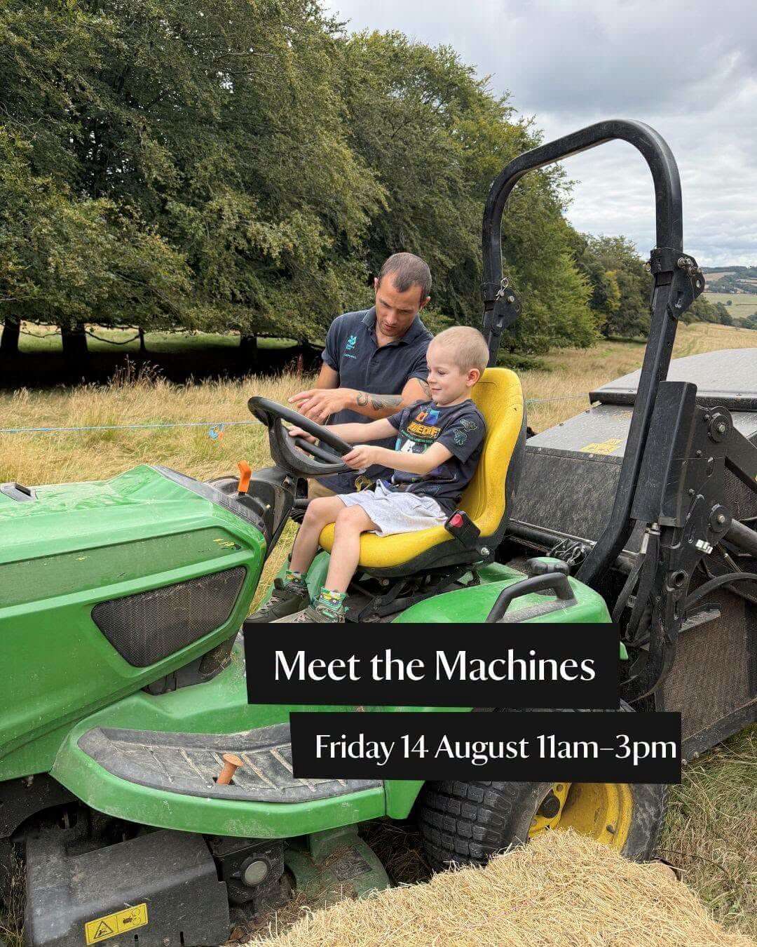 A National Trust ranger and a young child sitting on a green ride-on mower at Lanhydrock, with a promo overlay reading Meet the Machines Friday 14 August 11am to 3pm