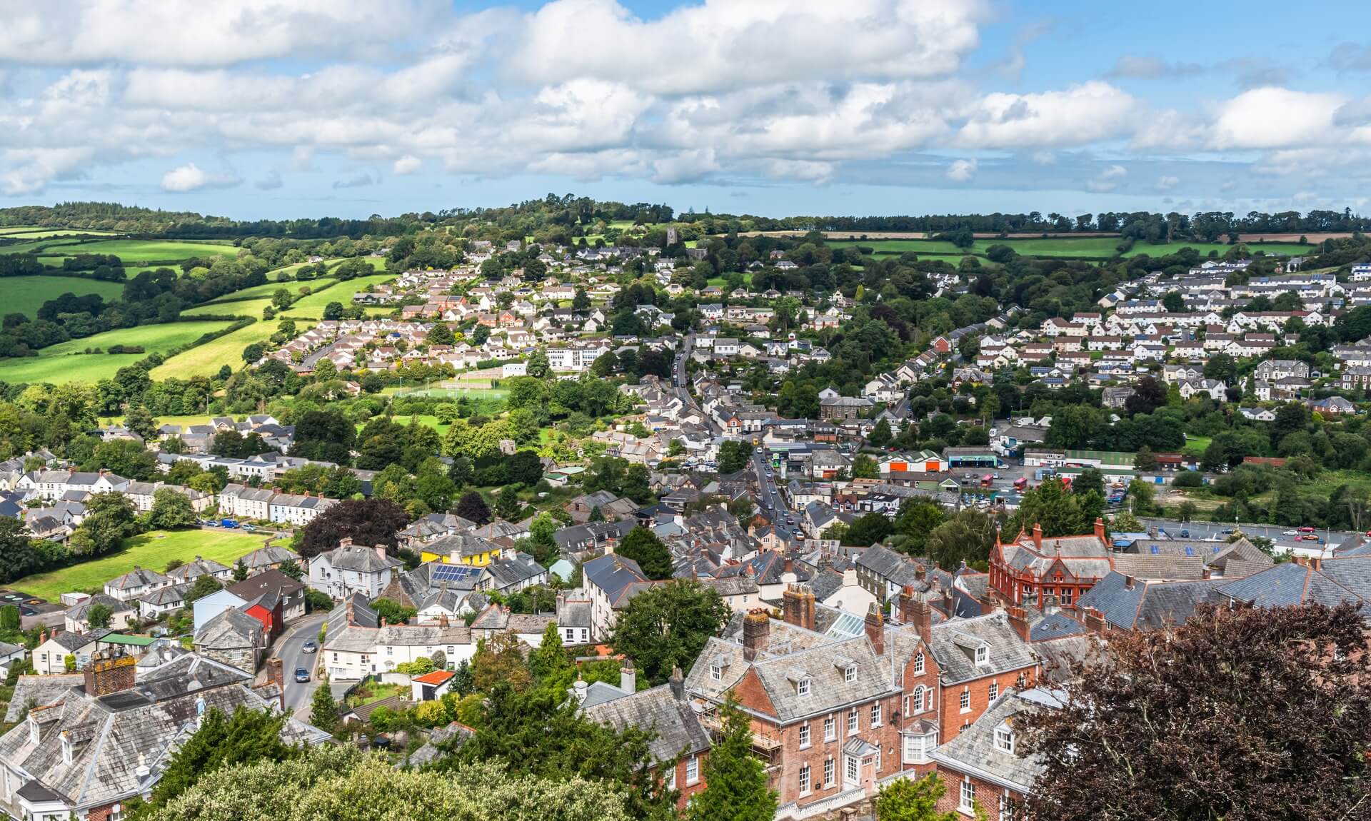 Elevated view over the rooftops and surrounding countryside of Launceston in Cornwall