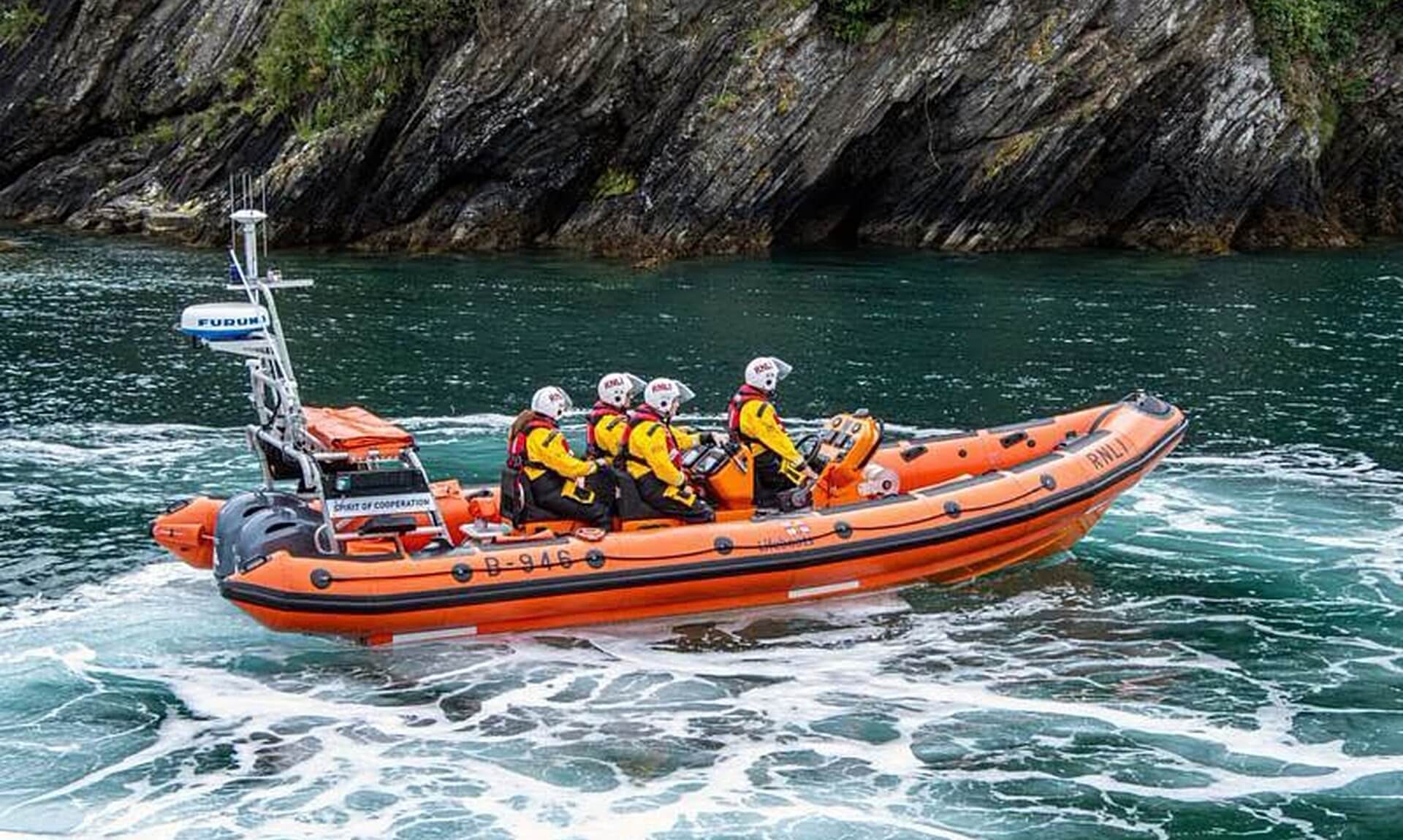 RNLI Looe Atlantic 85 inshore lifeboat Spirit of Cooperation with crew at sea