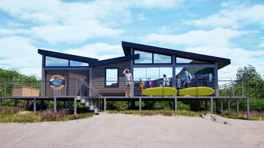 Design render of the proposed lifesaving clubhouse at Mawgan Porth beach, with people and rescue boards on the deck