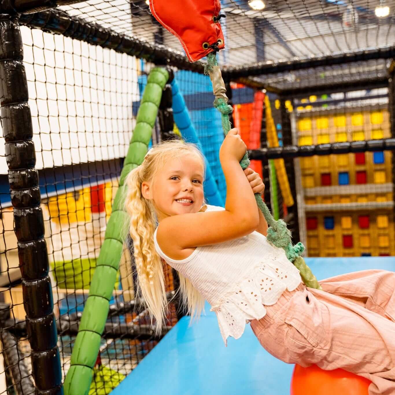 Child on the soft play climbing frame at NQY Rocks