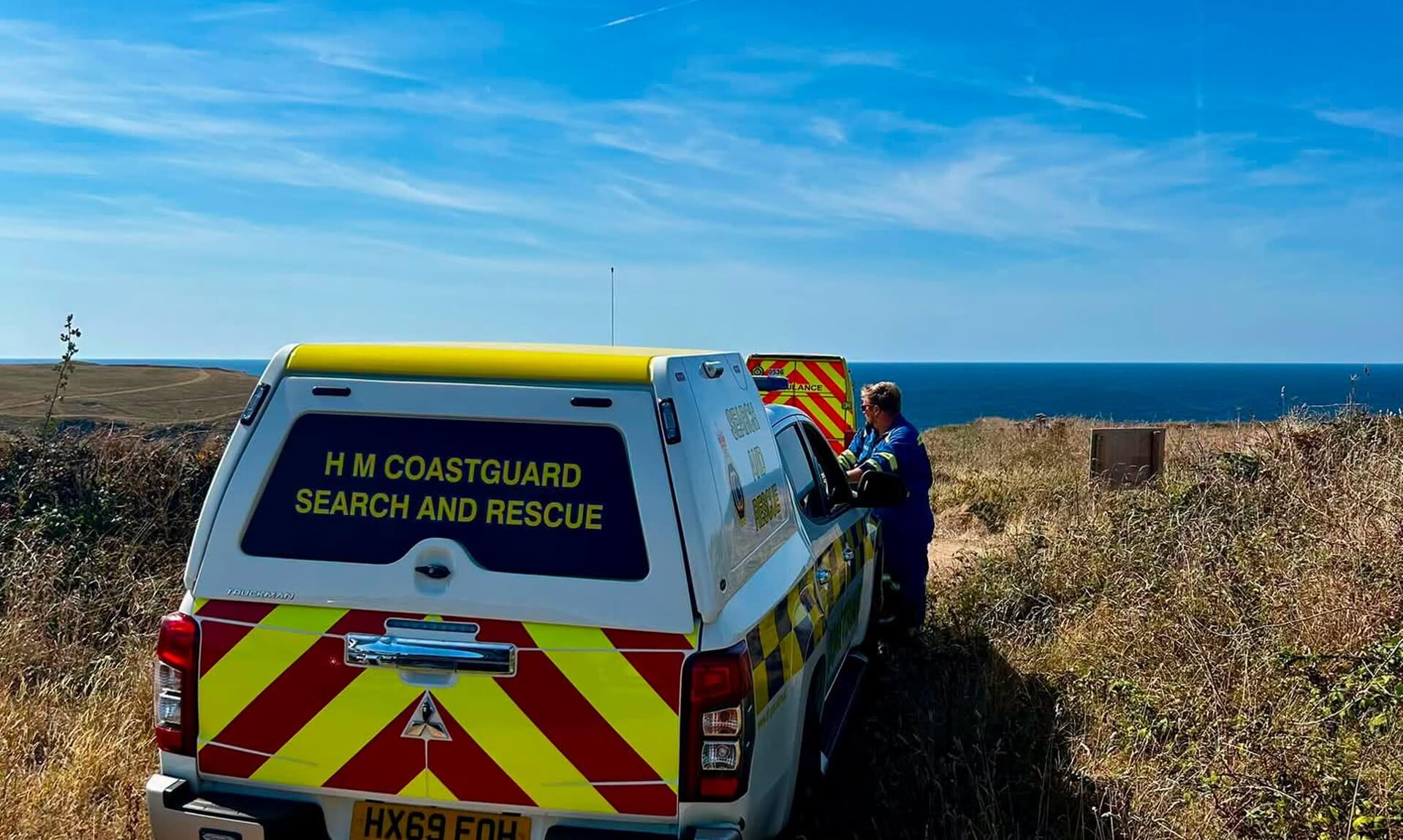 HM Coastguard search and rescue vehicle parked on a clifftop above the sea near West Pentire