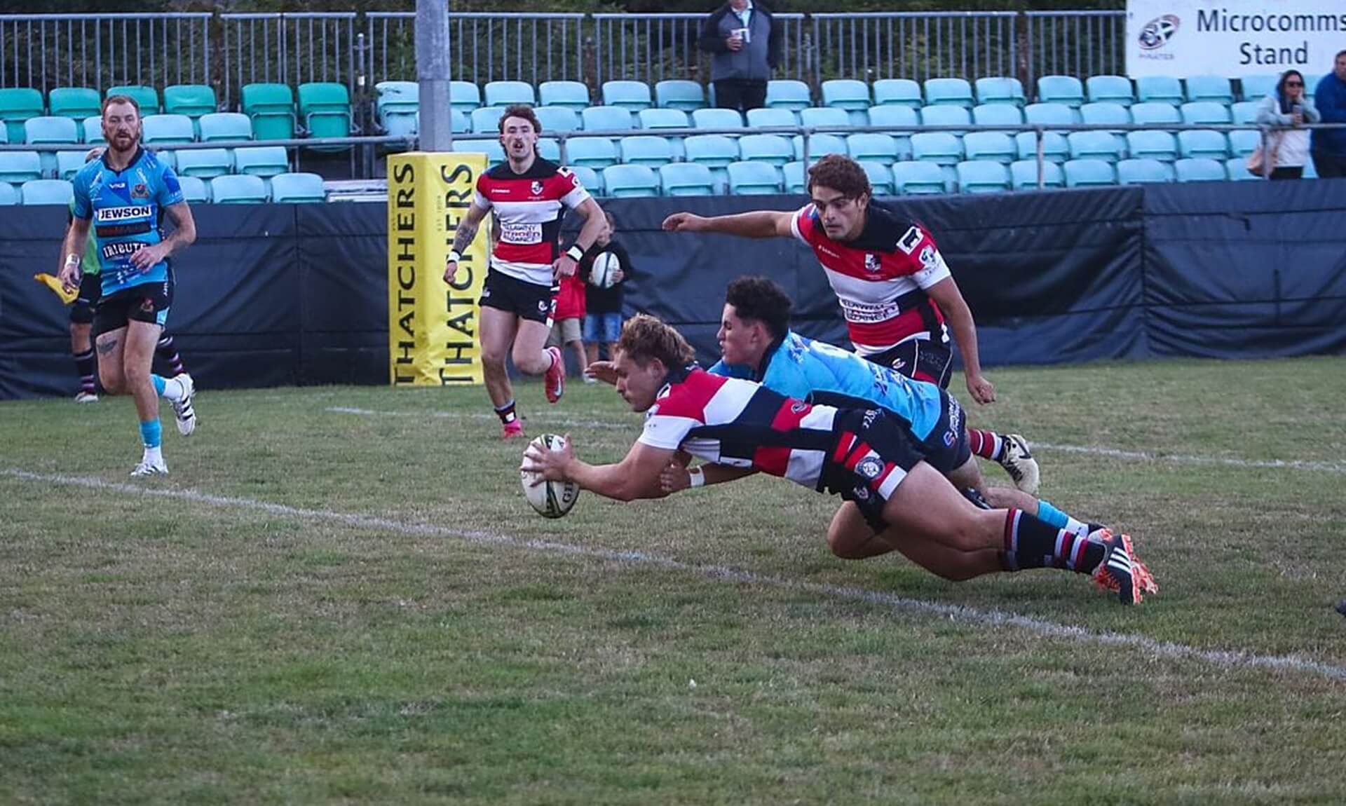 Harris Eddy dives over to score a try for Penzance and Newlyn against Redruth