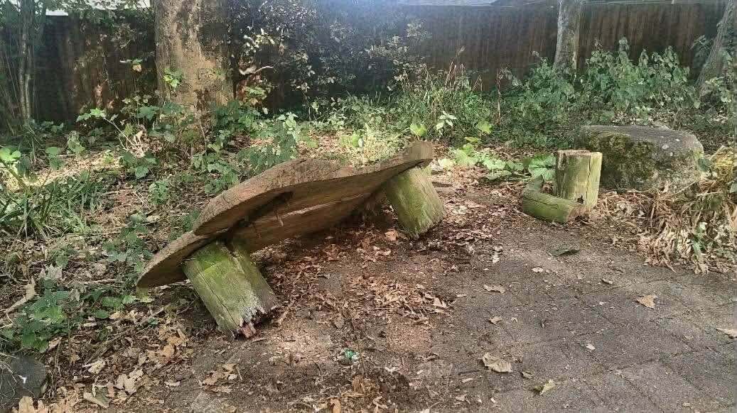 A wooden bench at The Spinney in Camborne that has come apart and is unsafe to use