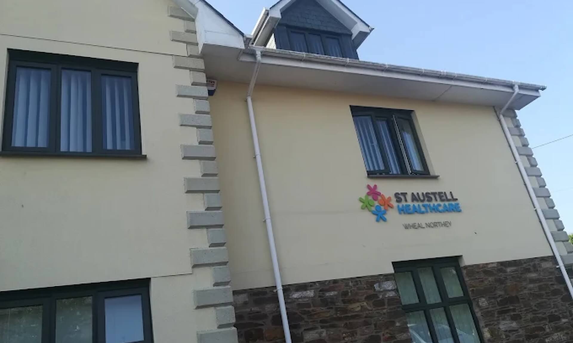 St Austell Healthcare signage on the Wheal Northey surgery building