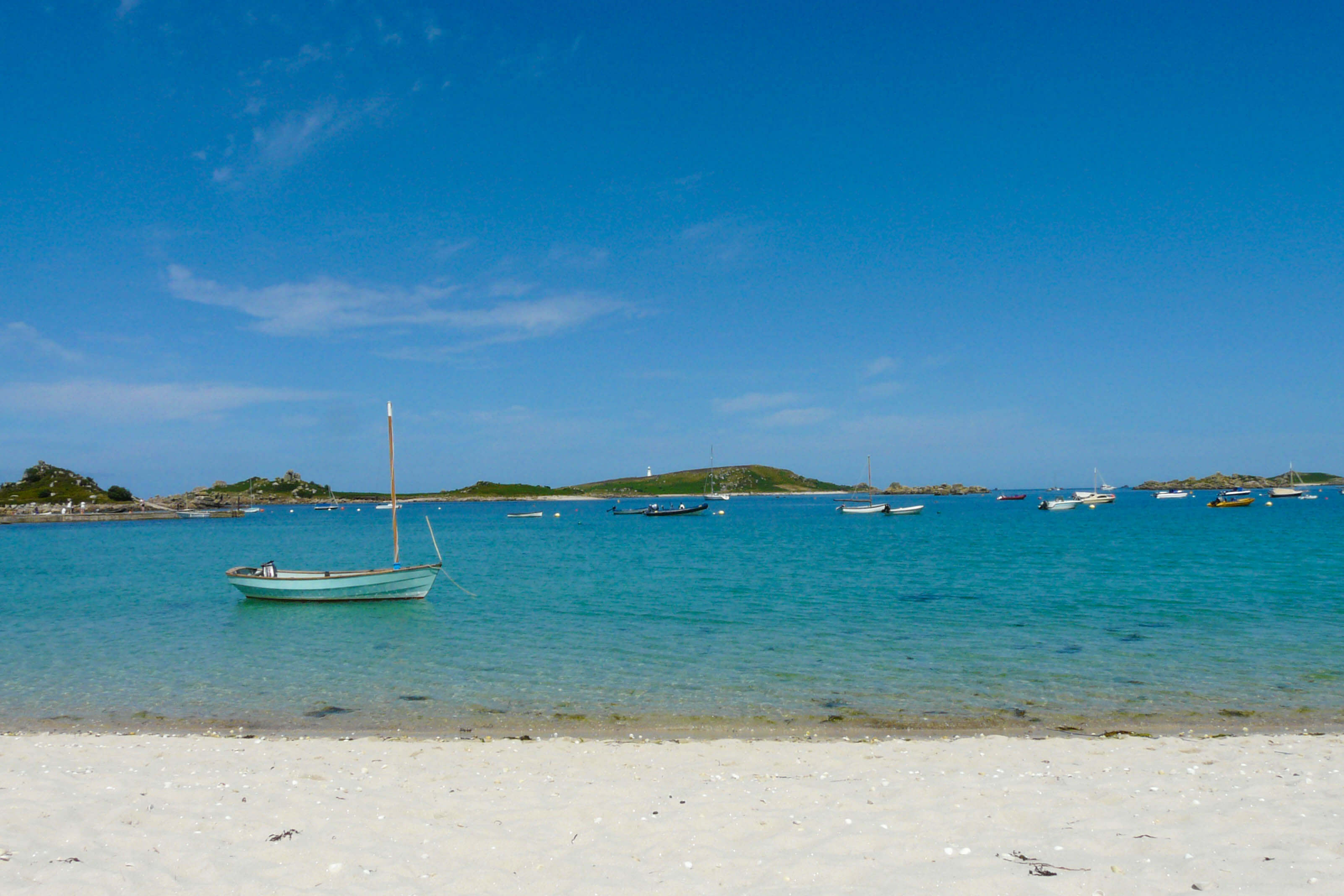 Boats moored in clear water off St Mary's, Isles of Scilly