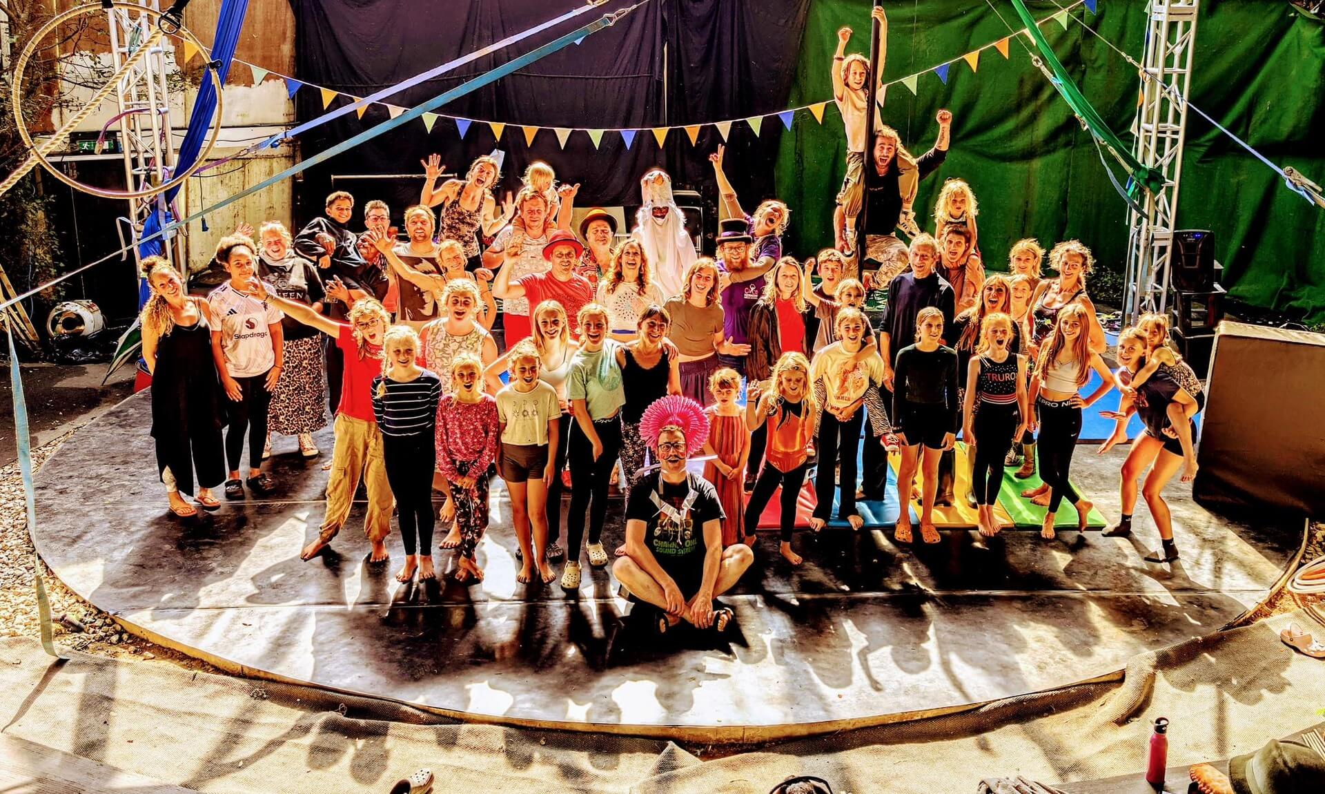 Large group of children and adults on the circus floor at Chyan Cultural Centre