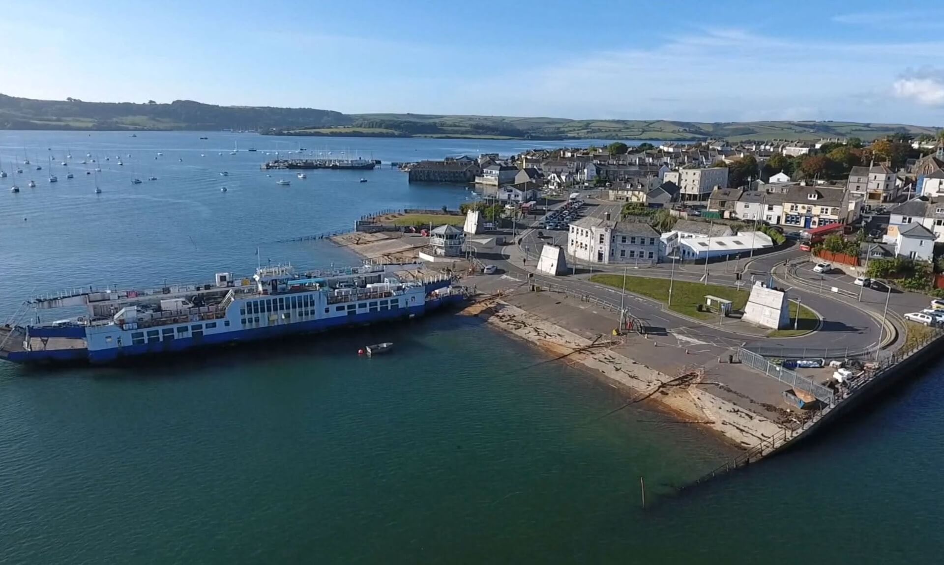 Aerial view of the Torpoint Ferry docked at the slipway with the town of Torpoint behind