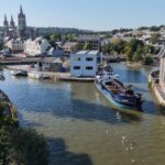 The dredger Mannin on the Truro River below Truro Cathedral