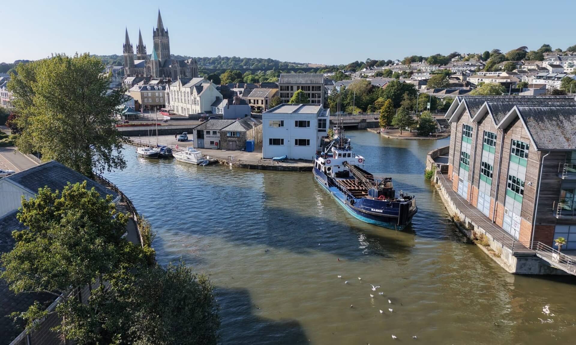 The dredger Mannin on the Truro River below Truro Cathedral